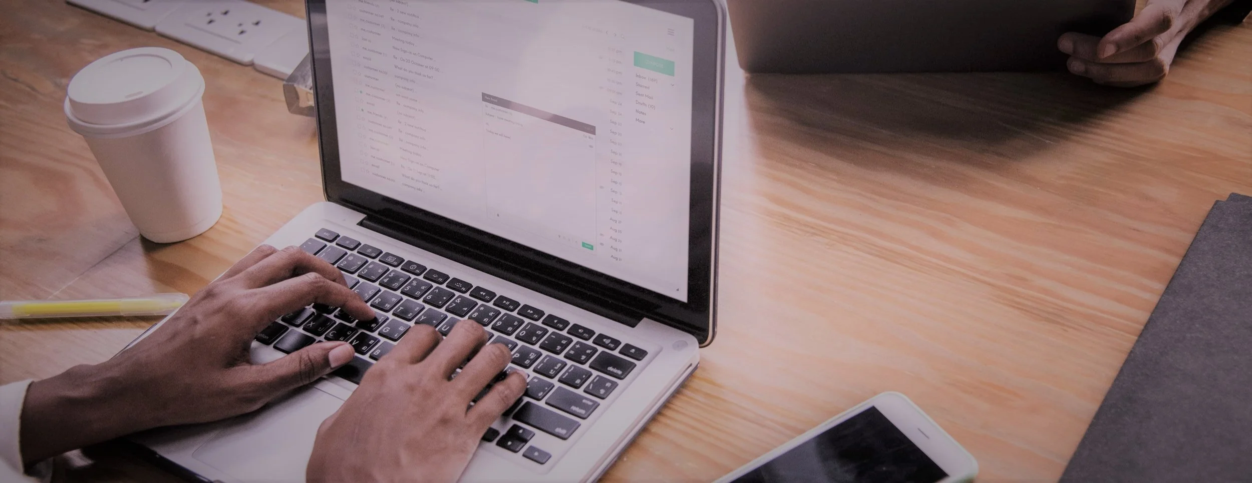 Smiling woman using unified communications