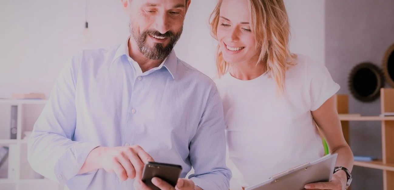 Smiling woman using unified communications