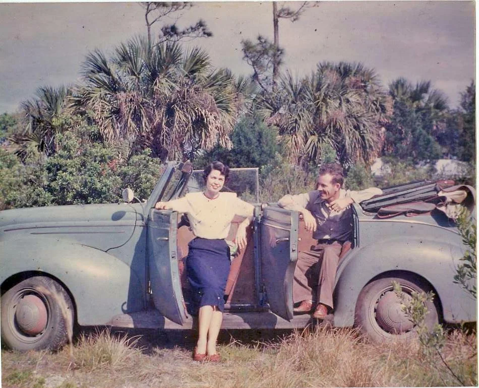 Grammy admired by Granddaddy Nelson in his car, Leapin' Lena.