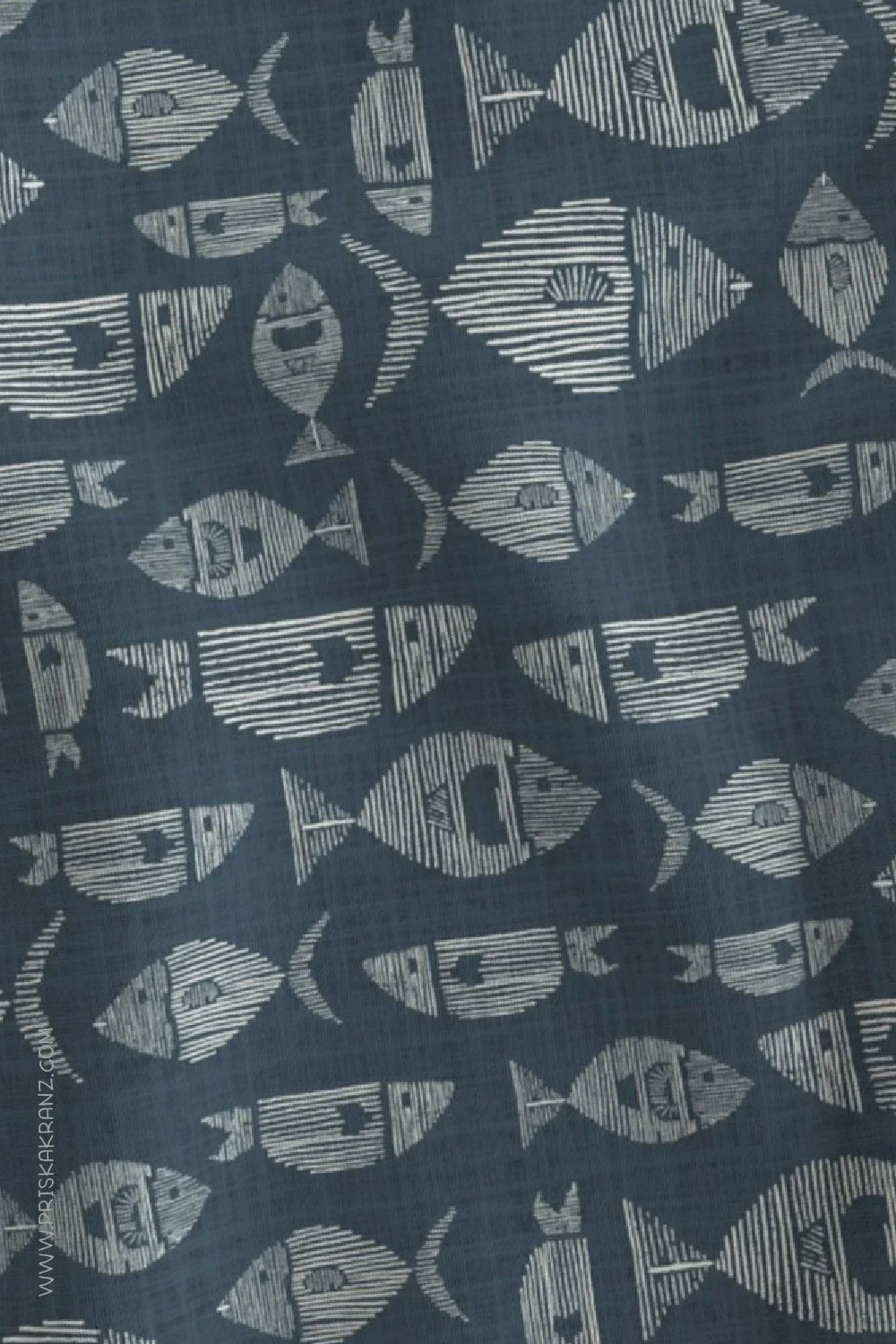 Dark blue fabric with hand-drawn fish in a minimal line pattern.