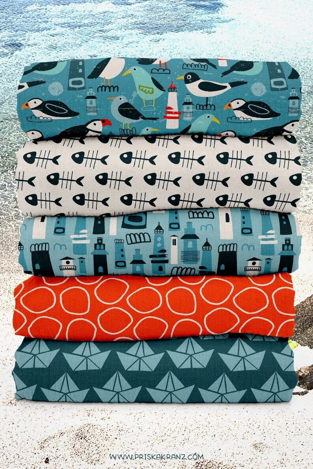 Stacked coastal fabric patterns with seabirds, fish bones, lighthouses, boats, and geometric designs in blue, teal, navy, and coral tones.