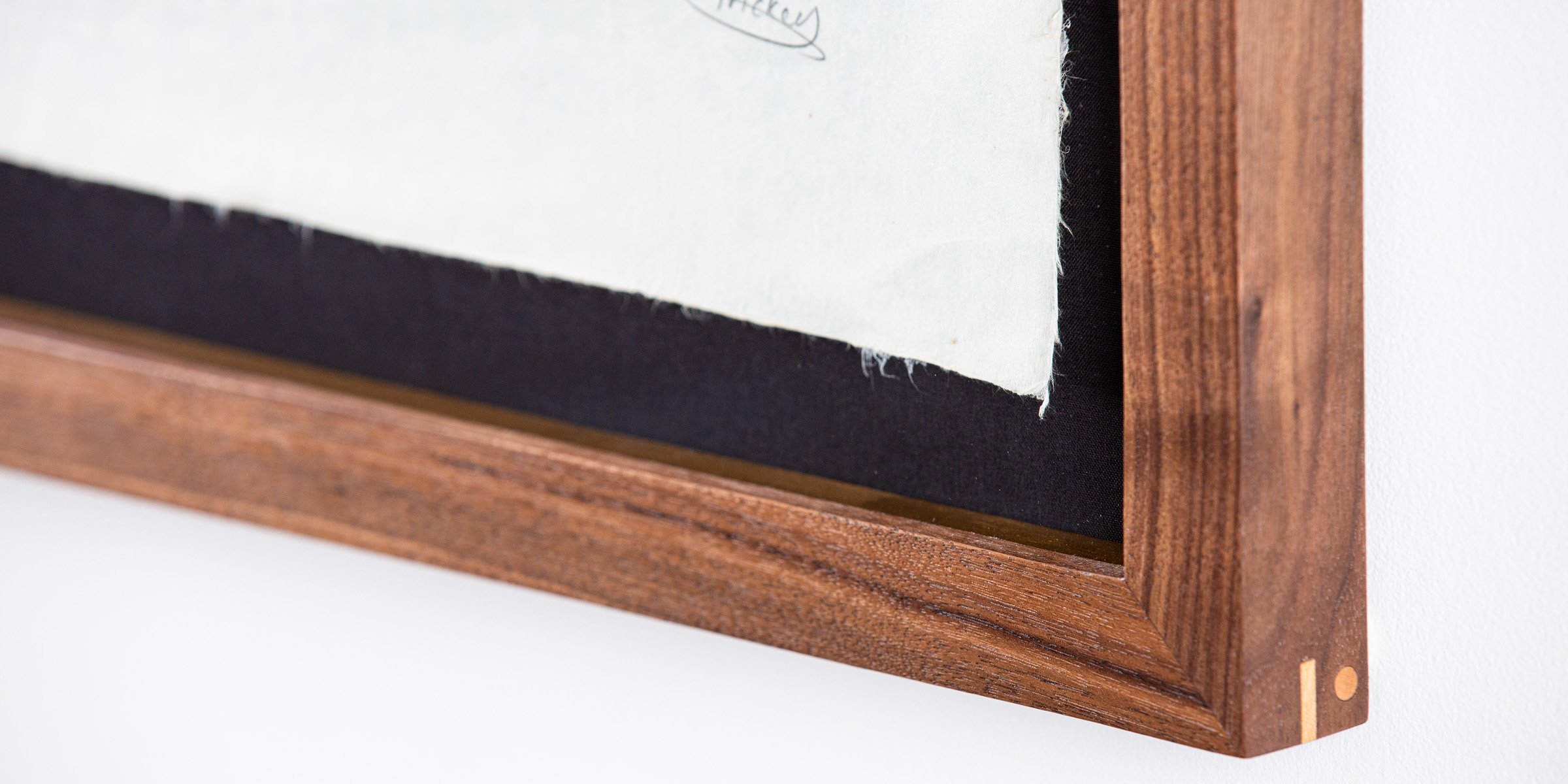 Bespoke black America walnut frame with maple spine an dowel joinery. Artwork is float mounted and glazed with AR70 glass. Framed by The Nunhead Framer in Nunhead SE15 London