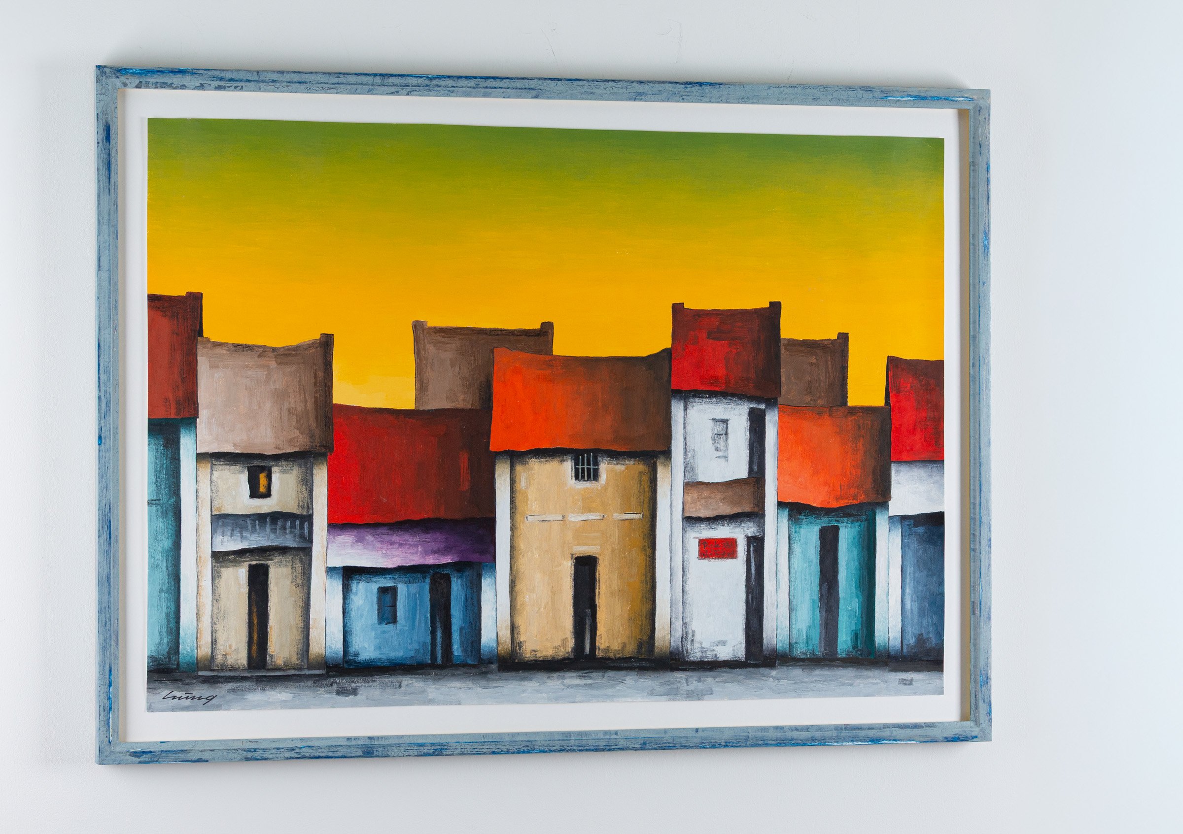 Colourful print in a hand painted distressed blue frame by The Nunhead Framer