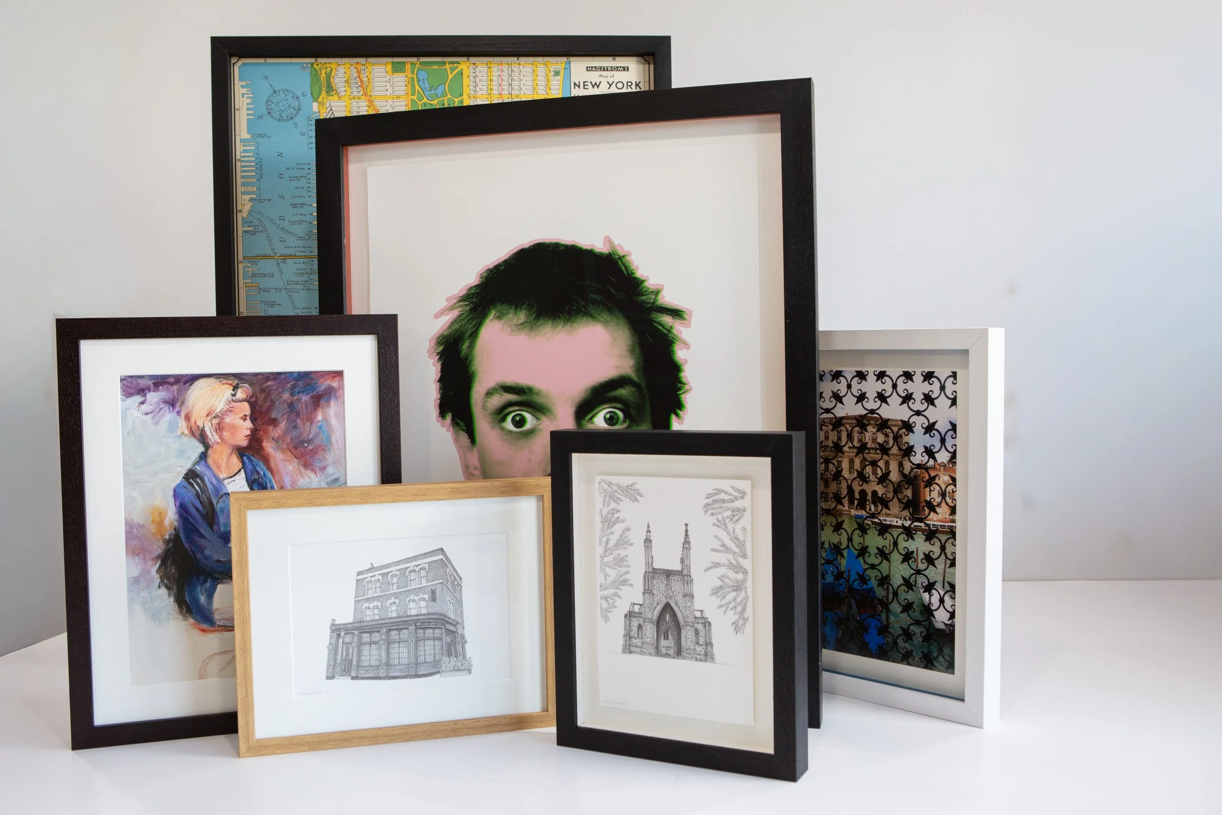 A selection of Essential picture frames in black, white and Wenge and oak wood effect. Made by The Nunhead Framer in Nunhead SE15 London