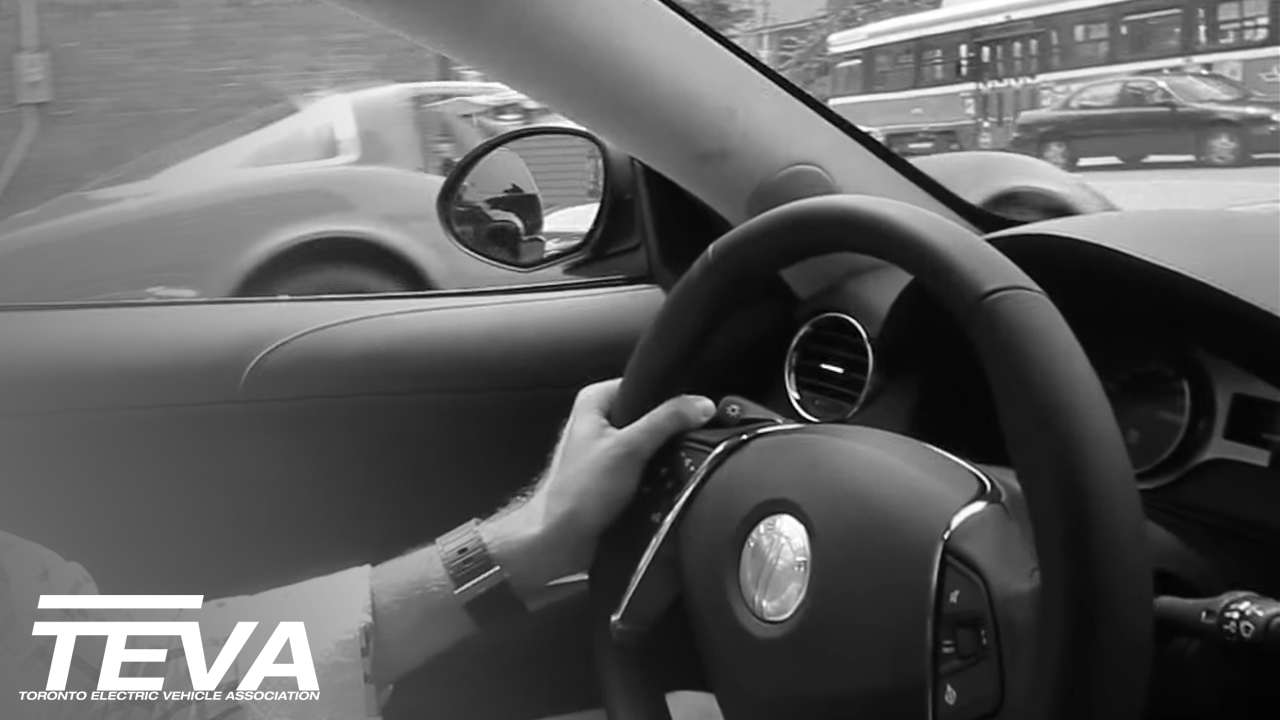 Fisker Karma drag race against a classic Corvette in Toronto