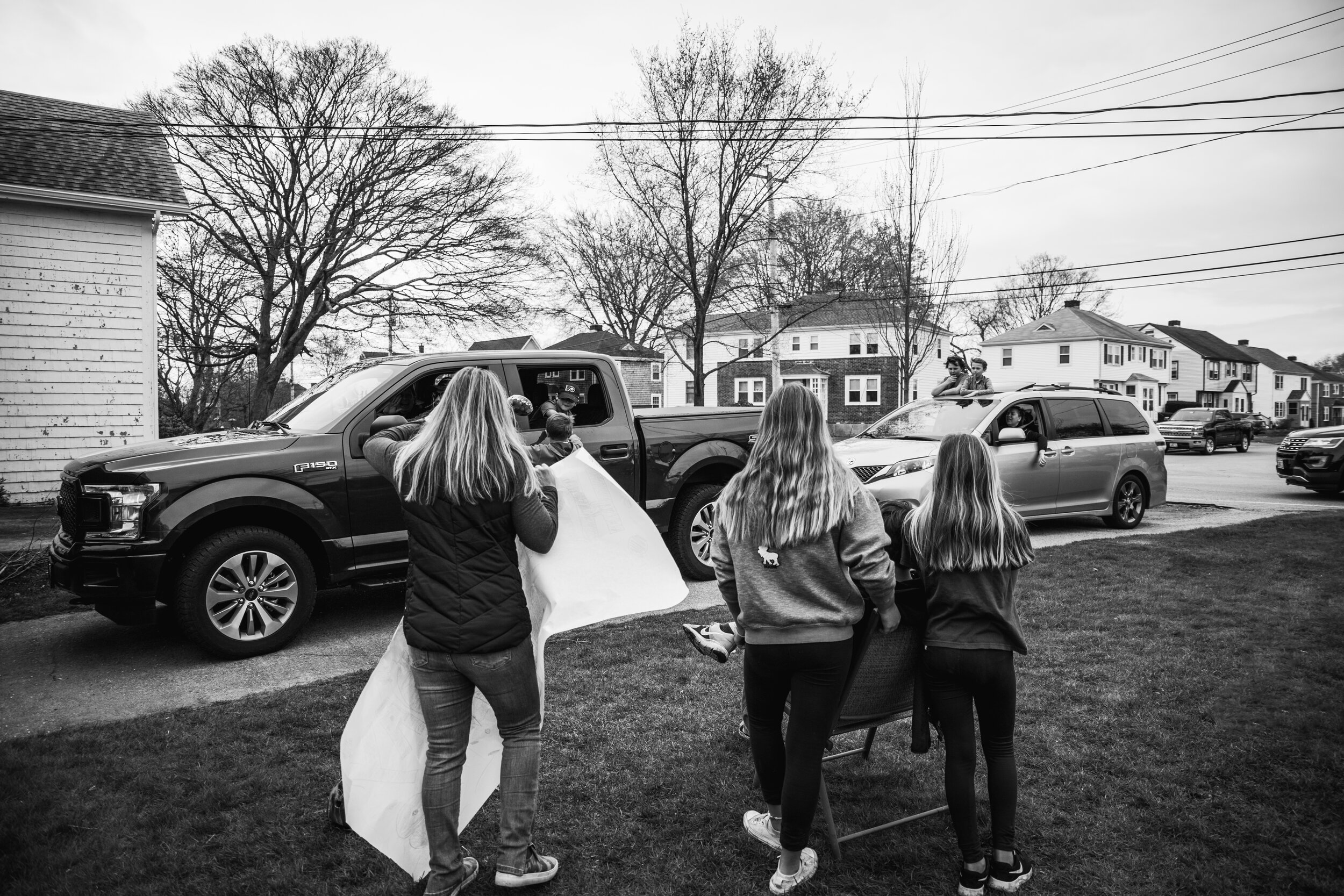 Girl's with sign