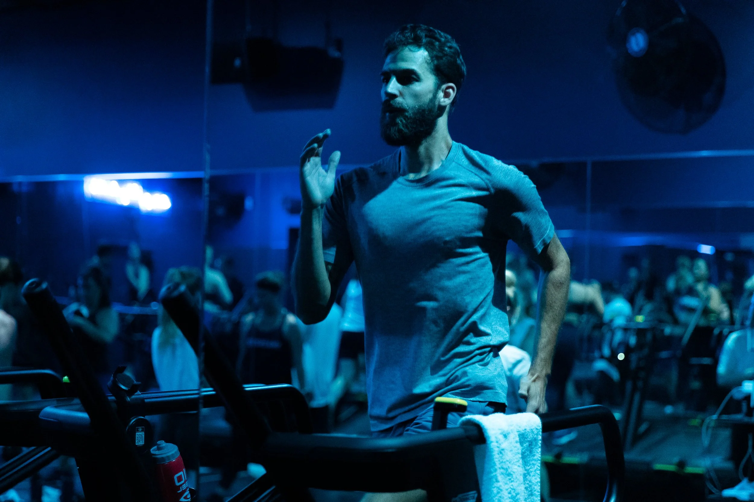 A man running on a non-motorized treadmill.