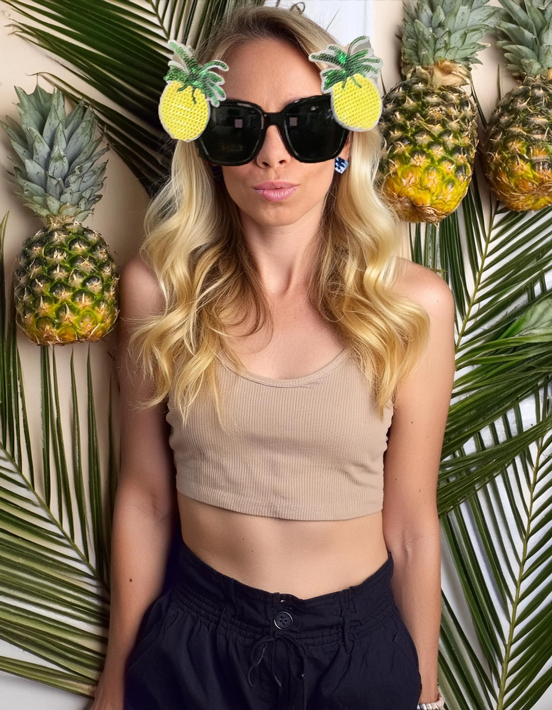 Firefly girl wearing glasses in a 80s pineapple backdrop 70503.jpg