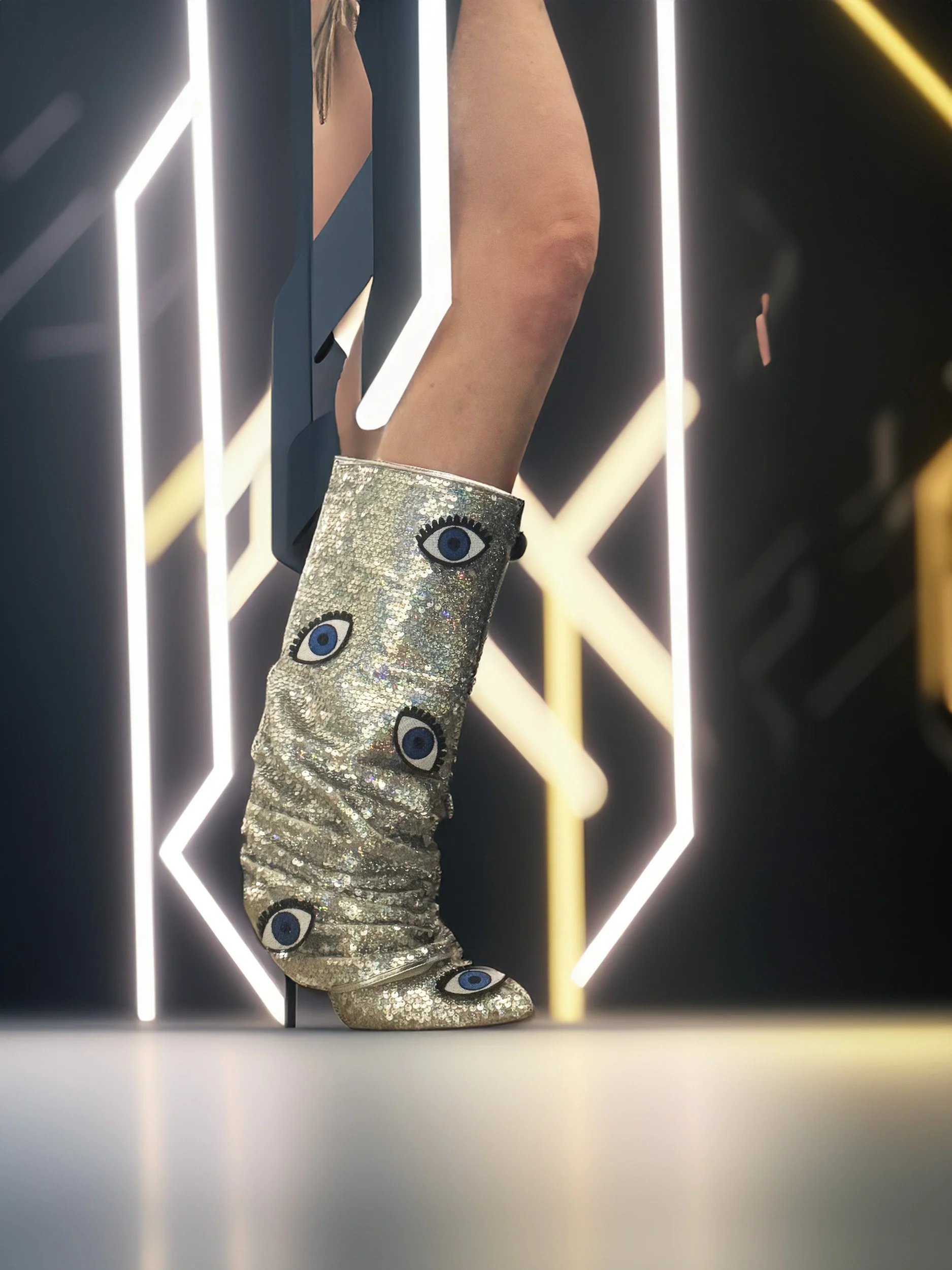 One-of-a-kind silver sequin boots embellished with embroidered evil eye patches, designed by artist Charity Huether. Mid-calf stiletto heel, size 8.5.