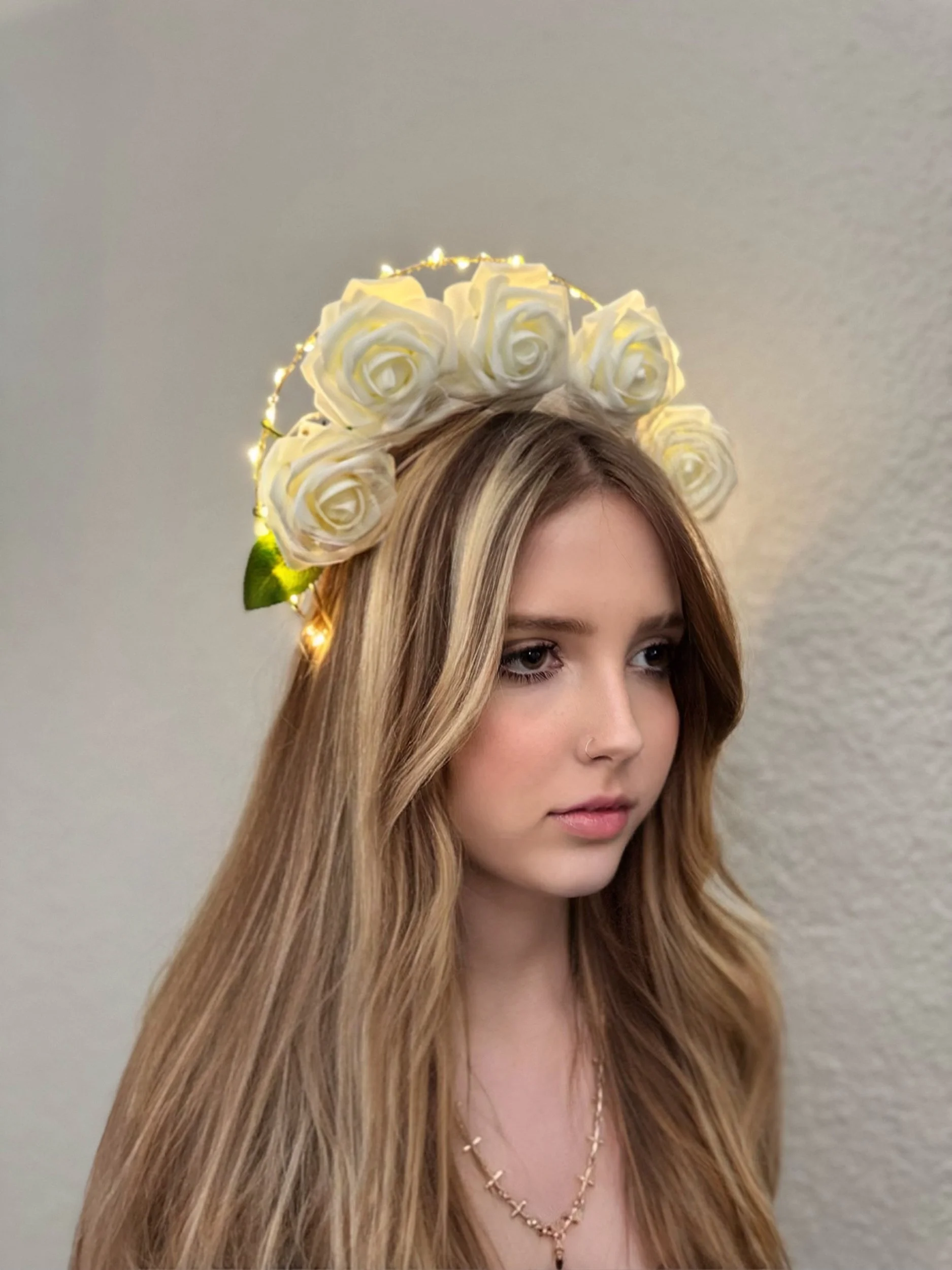 Ella Matheson showcasing a custom Light Up Festival Crown by Charity Huether, featuring LED lights and intricate details, perfect for festivals, weddings, and photo shoots