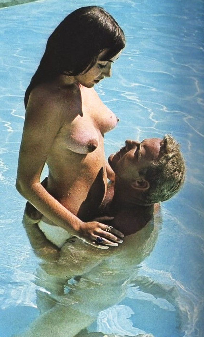 Naked couples swimming