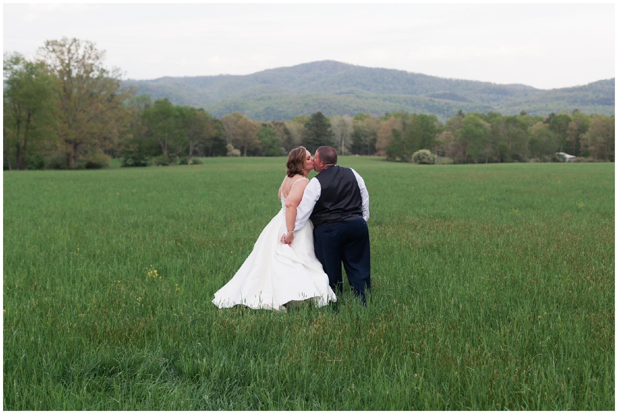 200-person Highland County Virginia mountaintop wedding in spring with large bridal party
