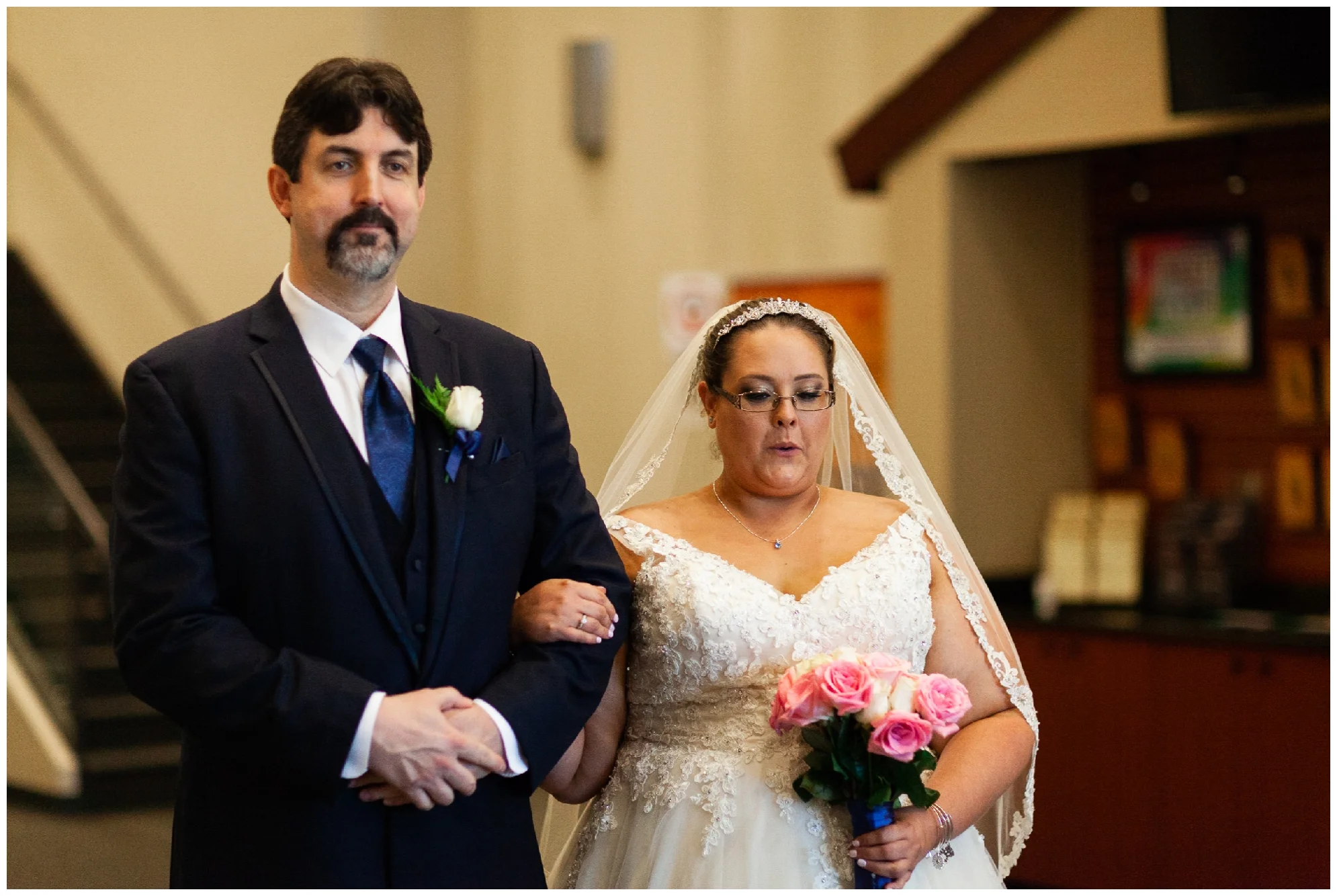 A beautiful navy and peach summer wedding at Quiet Waters Park in Annapolis, MD.