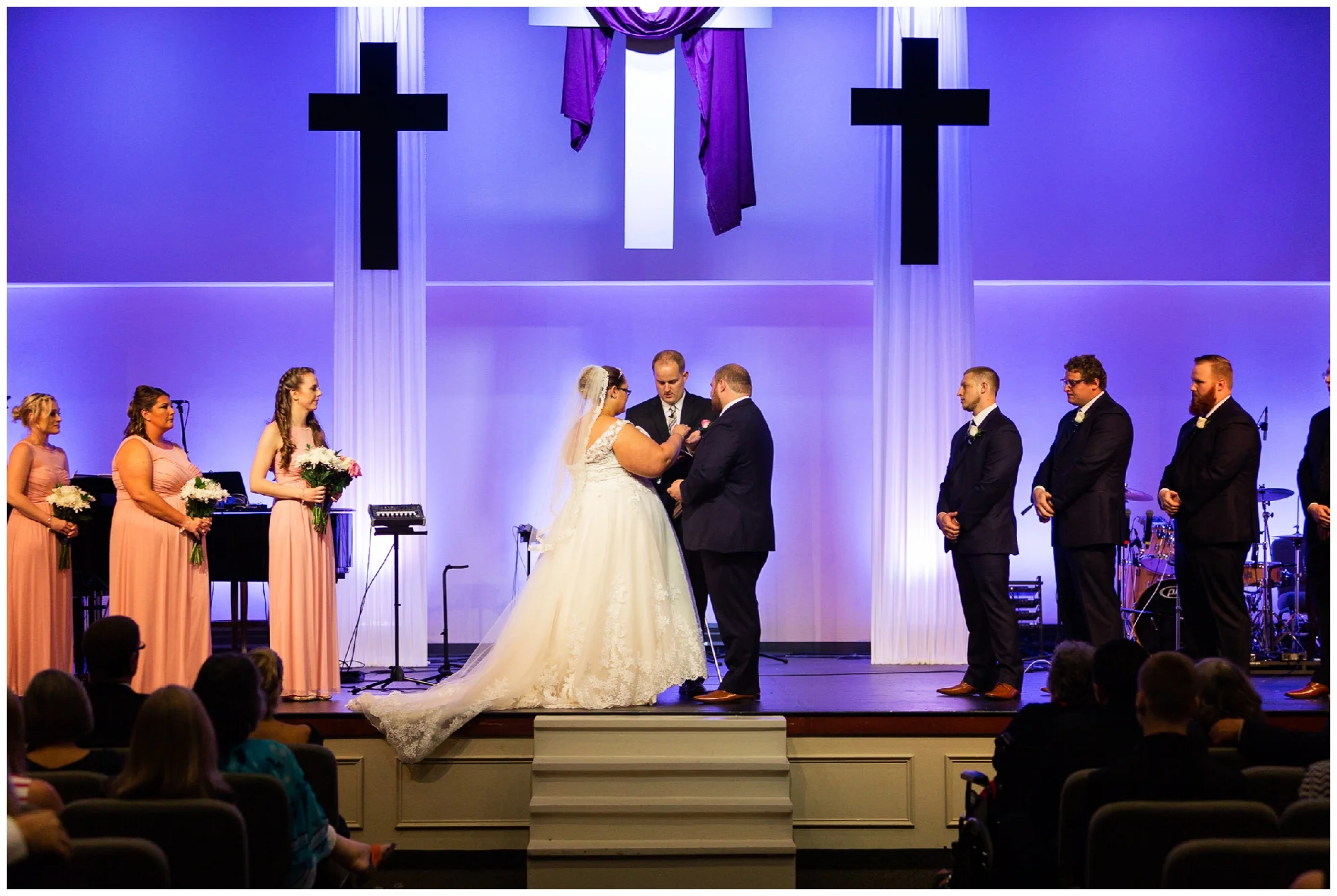 A beautiful navy and peach summer wedding at Quiet Waters Park in Annapolis, MD.