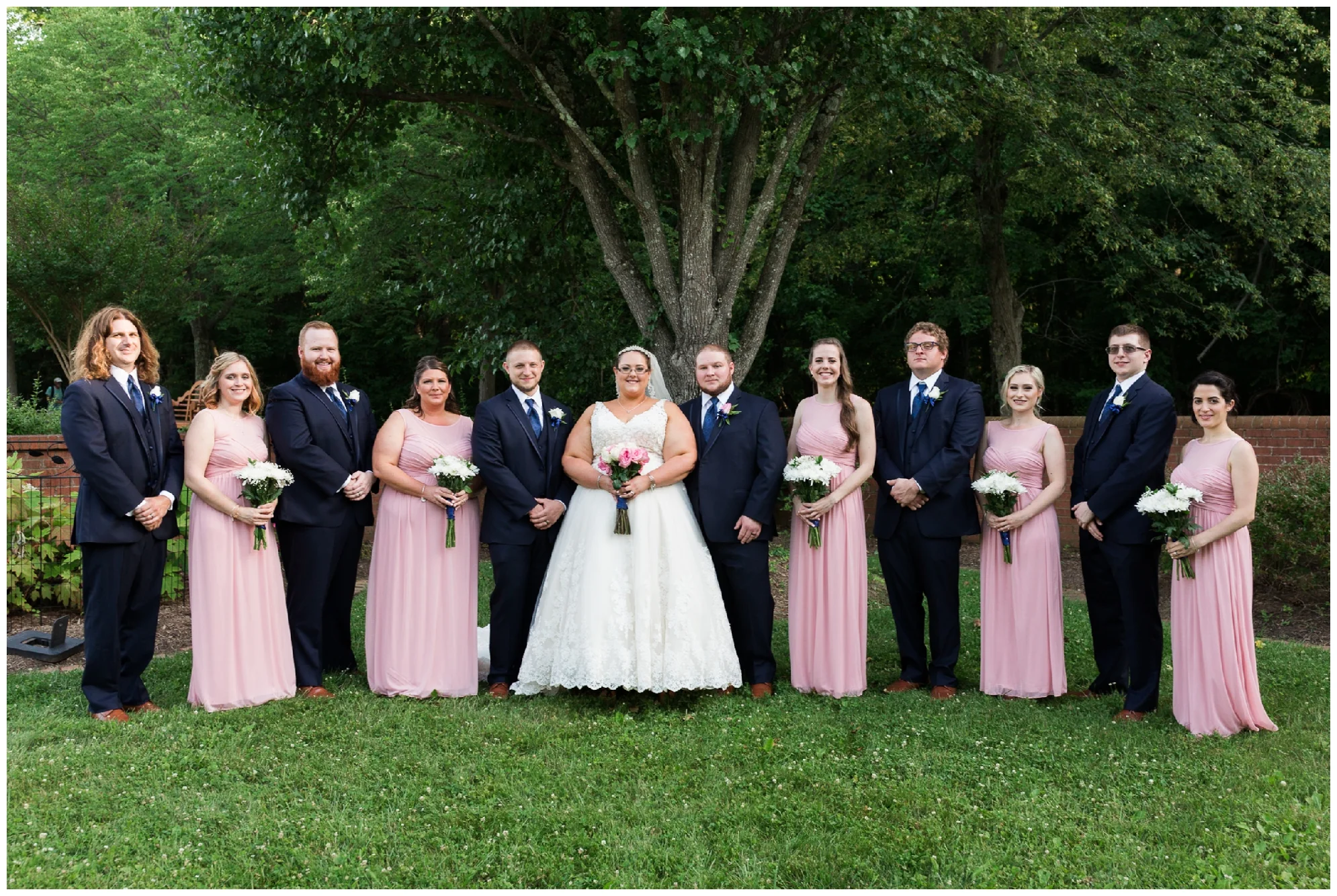 A beautiful navy and peach summer wedding at Quiet Waters Park in Annapolis, MD.