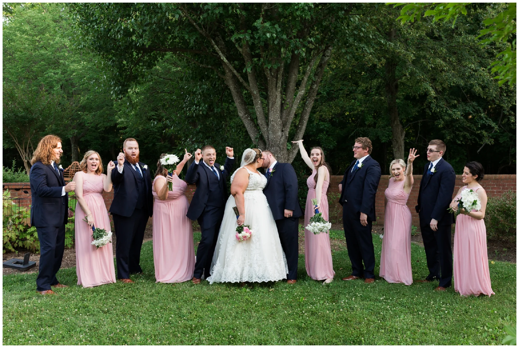 A beautiful navy and peach summer wedding at Quiet Waters Park in Annapolis, MD.