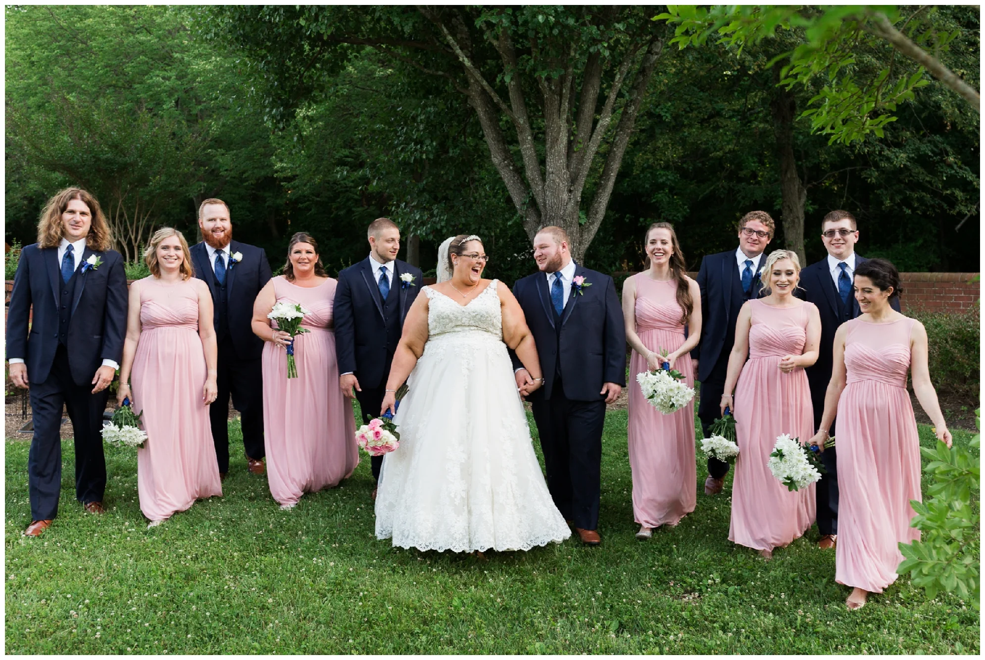 A beautiful navy and peach summer wedding at Quiet Waters Park in Annapolis, MD.