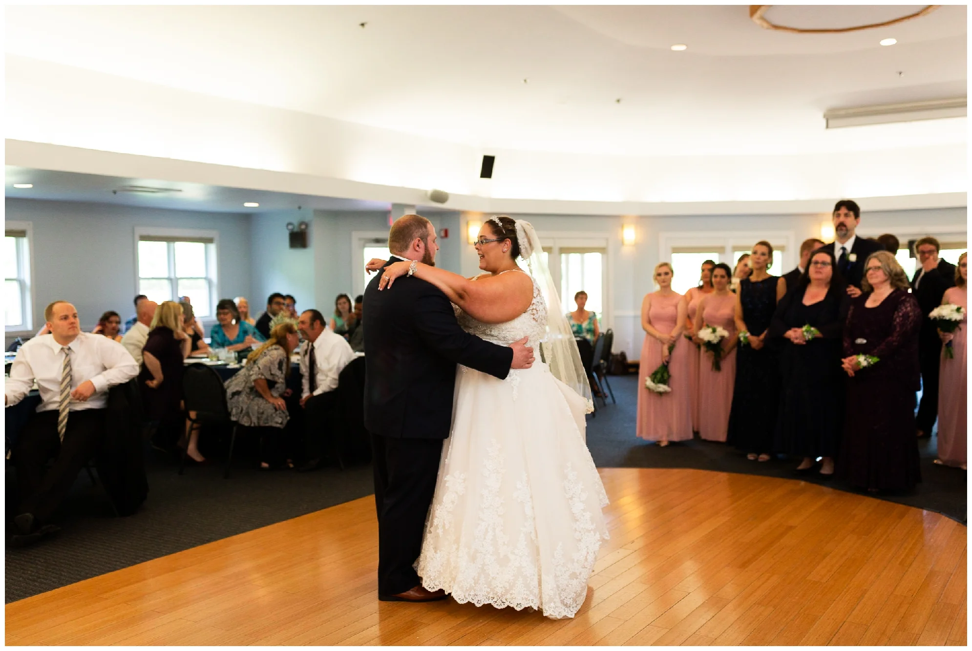 A beautiful navy and peach summer wedding at Quiet Waters Park in Annapolis, MD.