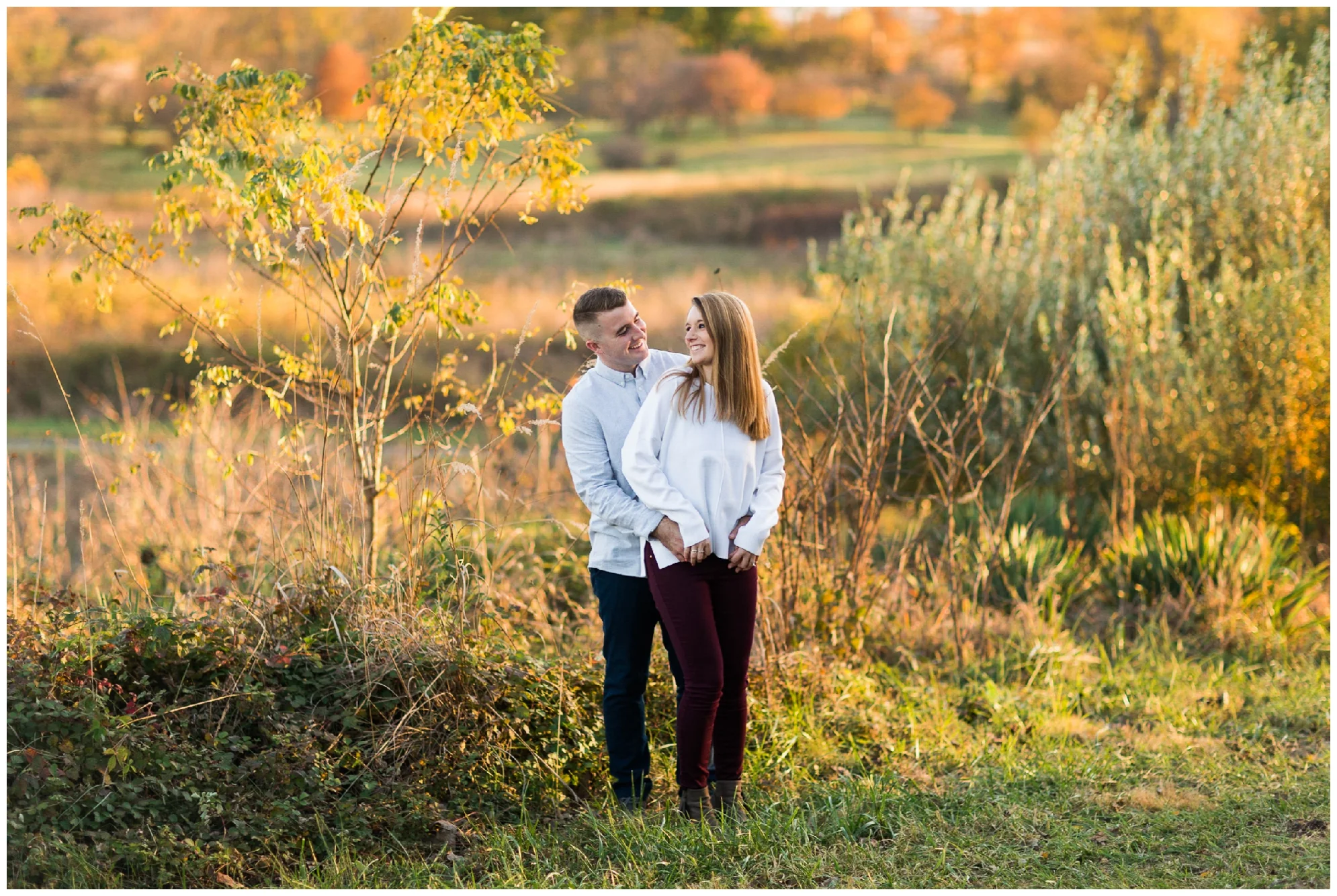 Fall engagement photo session at Blandy Experimental Farm in Winchester, Virginia featuring a military couple, gorgeous golden hour light and stunning fall colors!
