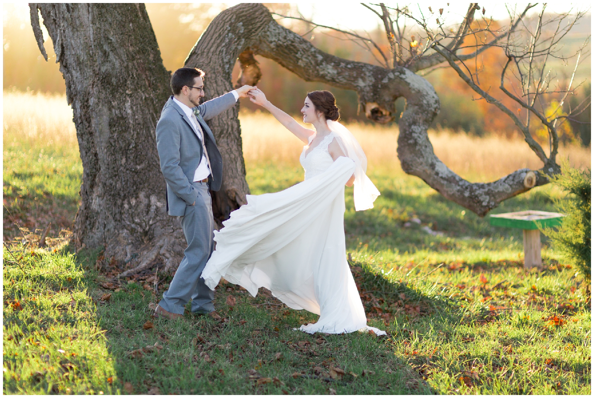 Fall wedding at Glen Ellen Farm featuring a beautiful golden and wine tones, an outdoor cocktail hour, and stunning florals