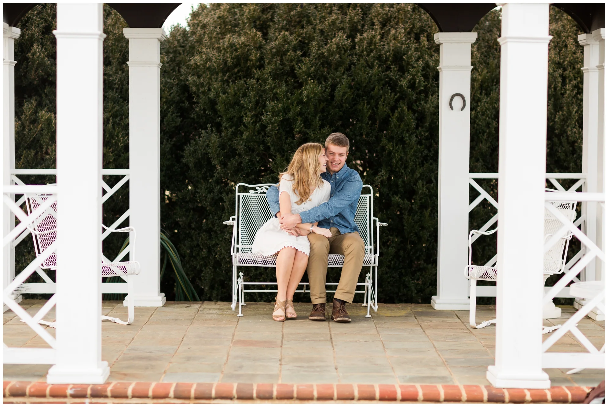 Winter engagement photo session at Gaie Lea wedding venue in Staunton, VA featuring mountain backdrops, golden hour light, a pond with a pier and cows!
