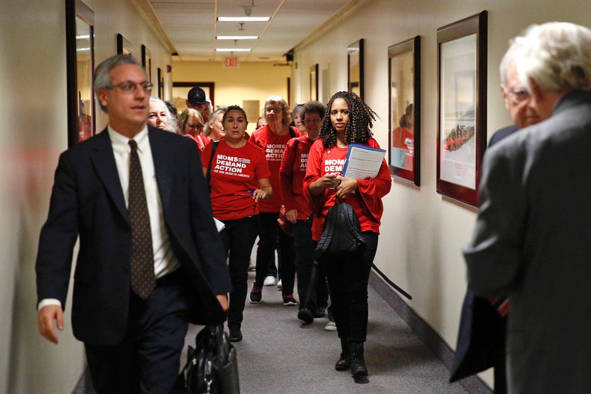  Around 150 representatives from Moms Demand Action descend on the Florida Capitol on Wednesday, Nov. 8, 2017, to lobby lawmakers about gun bills for the upcoming session. Here a group make their way to their first appointment with a legislator. 
