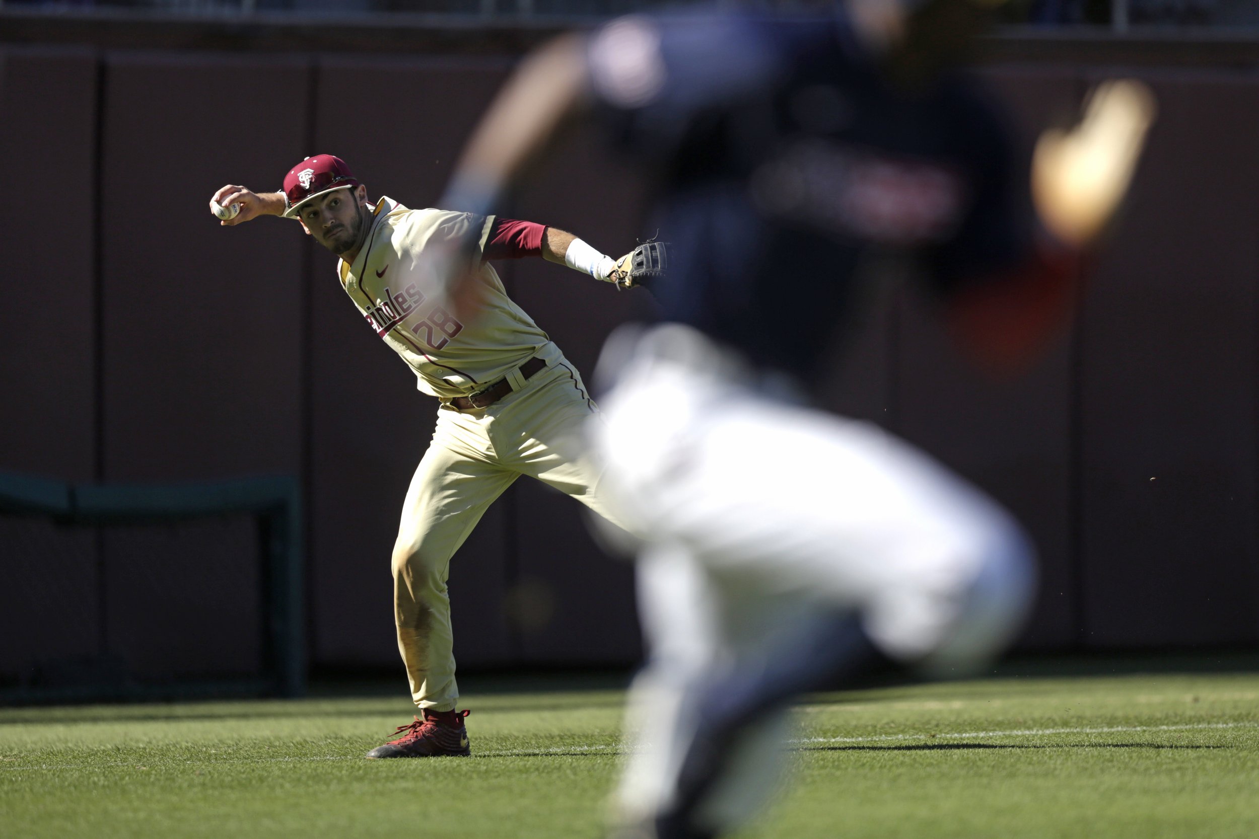  Third baseman Dylan Busby fields the ball during the third game in FSU's series with Samford at the Dick Howser Stadium in Tallahassee, Fla. on Feb 26, 2017. 