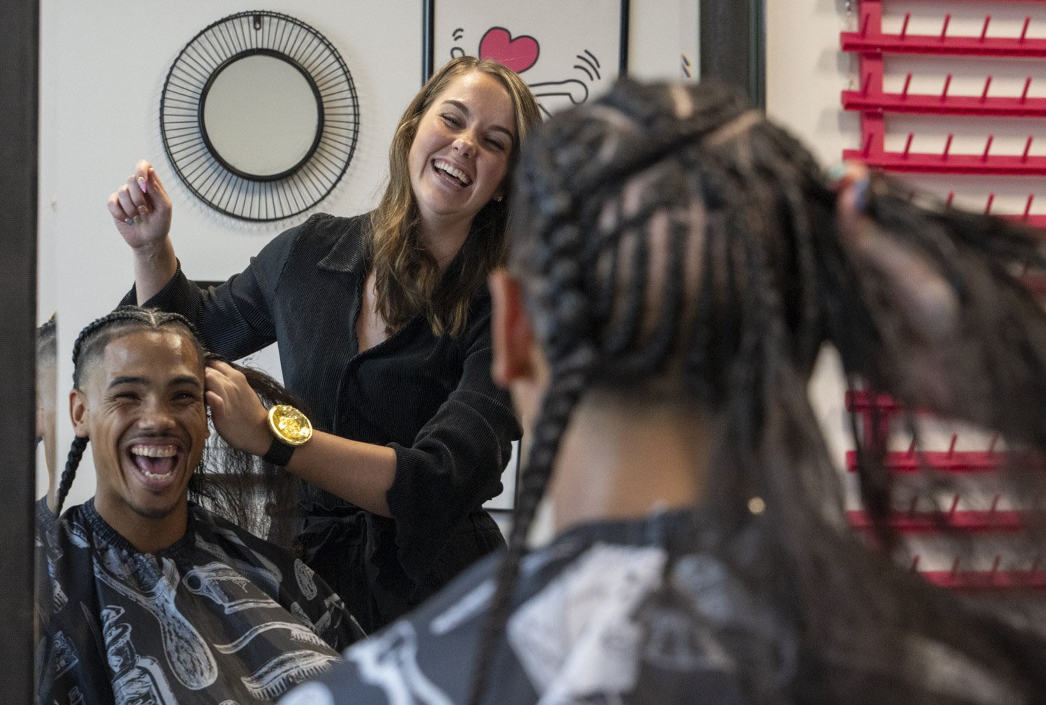  Davin Juerling works with her client Kendrick Murphy on Thursday, Aug. 24, 2023 at Juerling’s Twelve 19 Salon in Indianapolis. Murphy has been entrusting his hair care to Juerling since she was 19 and working out of her house. 