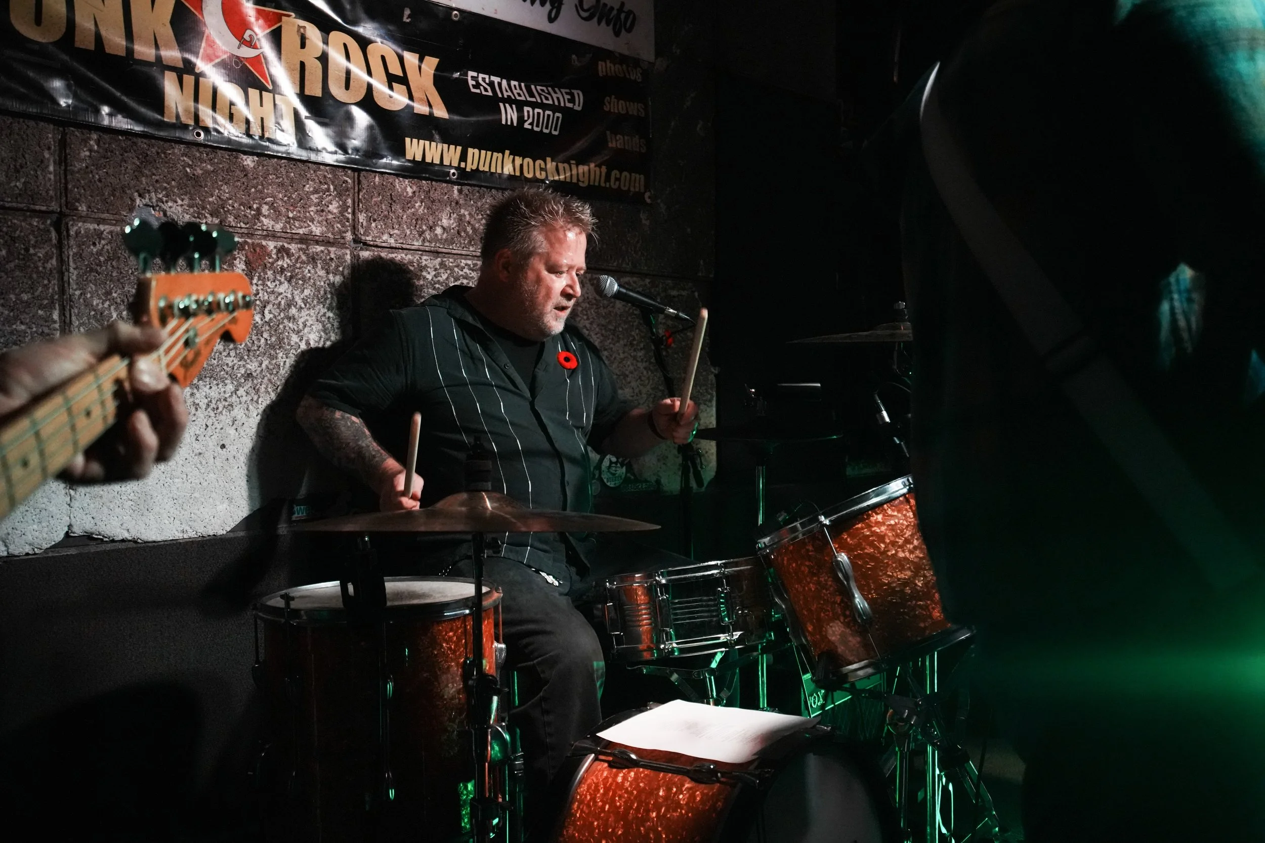  J.J.Pearson plays with Xan Hughes and the Thera-Men Saturday, Nov. 11, 2023, at the Melody Inn in Indianapolis. The band plays punk rock covers with Hughes, the son of Pearson’s former bandmate, interpreting the vocal part on theremin.  