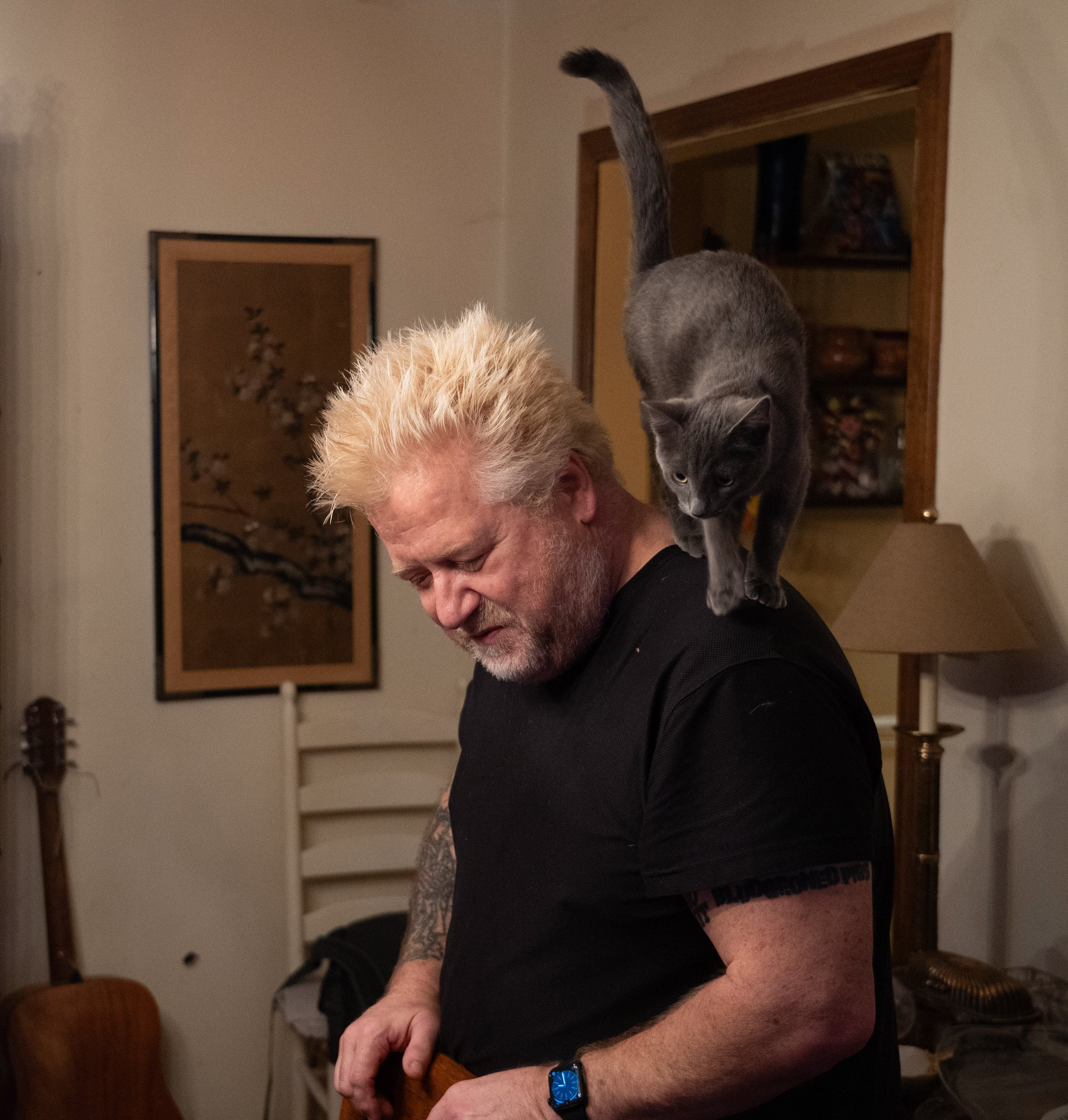  J.J.Pearson plays with his new kitten Josie May Screech —Josie the Pussycat — in his Indianapolis home Saturday, Dec. 23, 2023. 