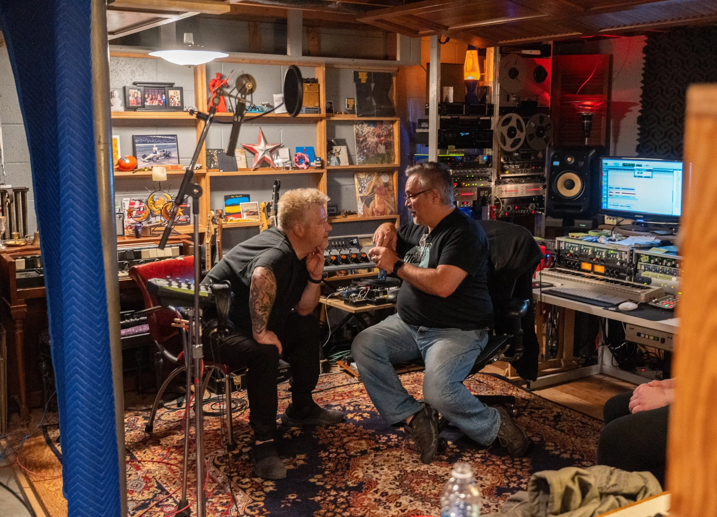  J.J.Pearson and Joe Cheeseman discuss production of Panty Line’s EP Saturday, Dec. 30, 2023 during a recording session at Cheeseman’s basement studio in Indianapolis.  