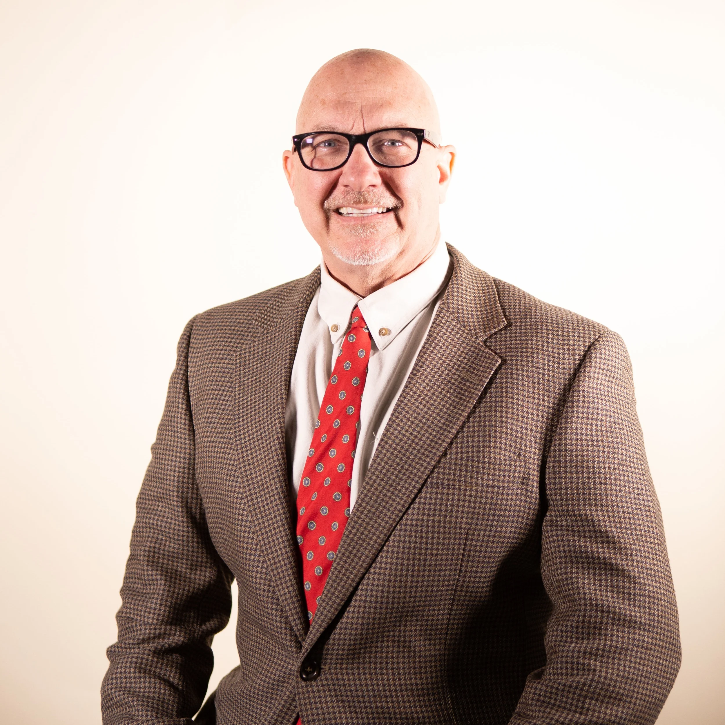 Dr. Quentin Washispack is a Conway resident and teaches Introduction to Christian Ministry. Dr. Washispack goes by the familiar name “Dr. Q” here at OBU at NLC and also is a pastor at New Life Church. Dr. Q received his undergraduate degree in industrial Engineering at Louisiana State University. He went on to complete his Master of Theology at Dallas Theological Seminary as well as his Doctorate of Ministry. Dr. Q enjoys deer hunting with his cross bow, muzzle loading and modern gun, he loves Tony’s Chachere’s Creole Seasoning on everything he heats and is a big LSU fan. “All four of my children have attended the University of Arkansas. My wife and I graduated from LSU so we have a house divided!”