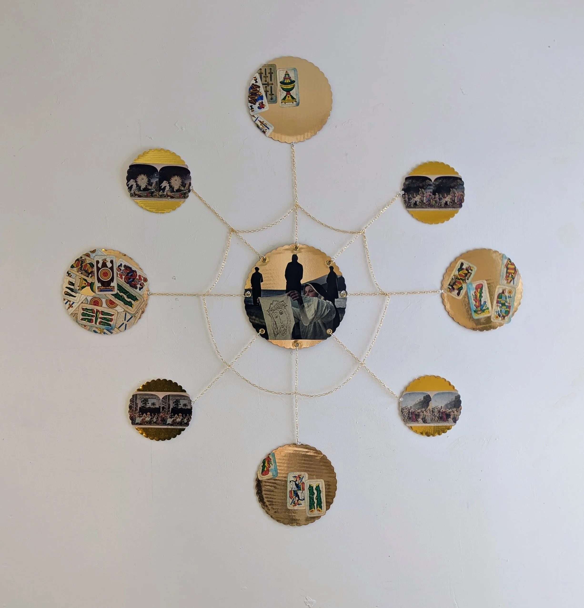 Re Di Denari
 
 collage on cake rounds, chain, hardware  40x40 in 