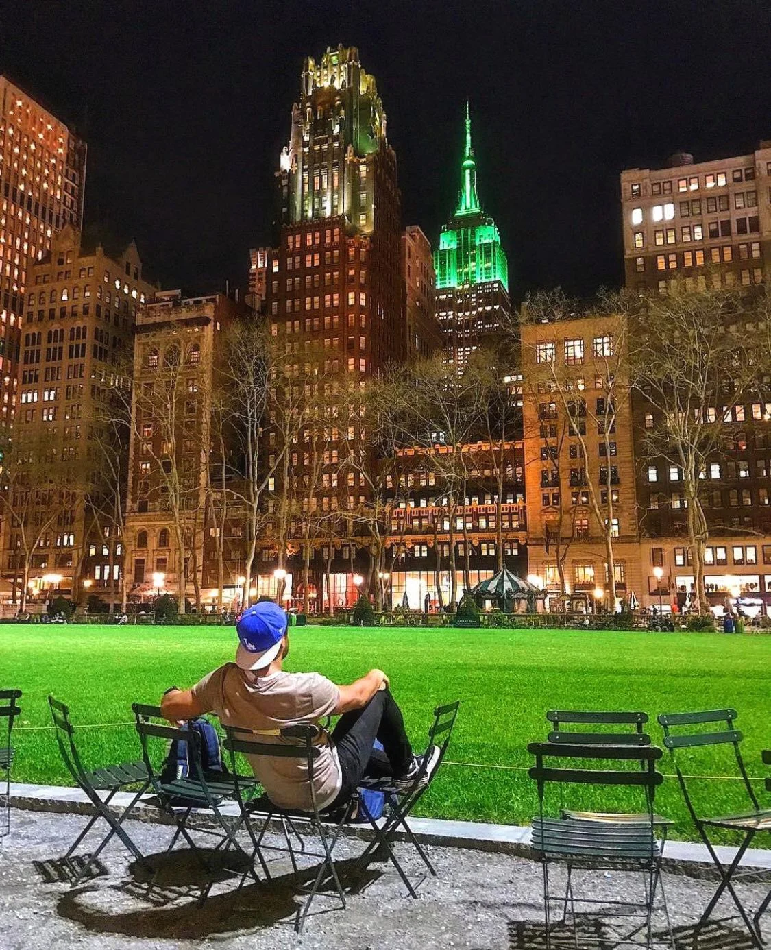 chilling out in bryant park admiring an iconic landmark and the green atmosphere
