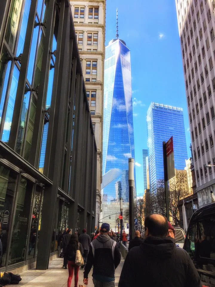 lower manhattan surrounded by blu sky