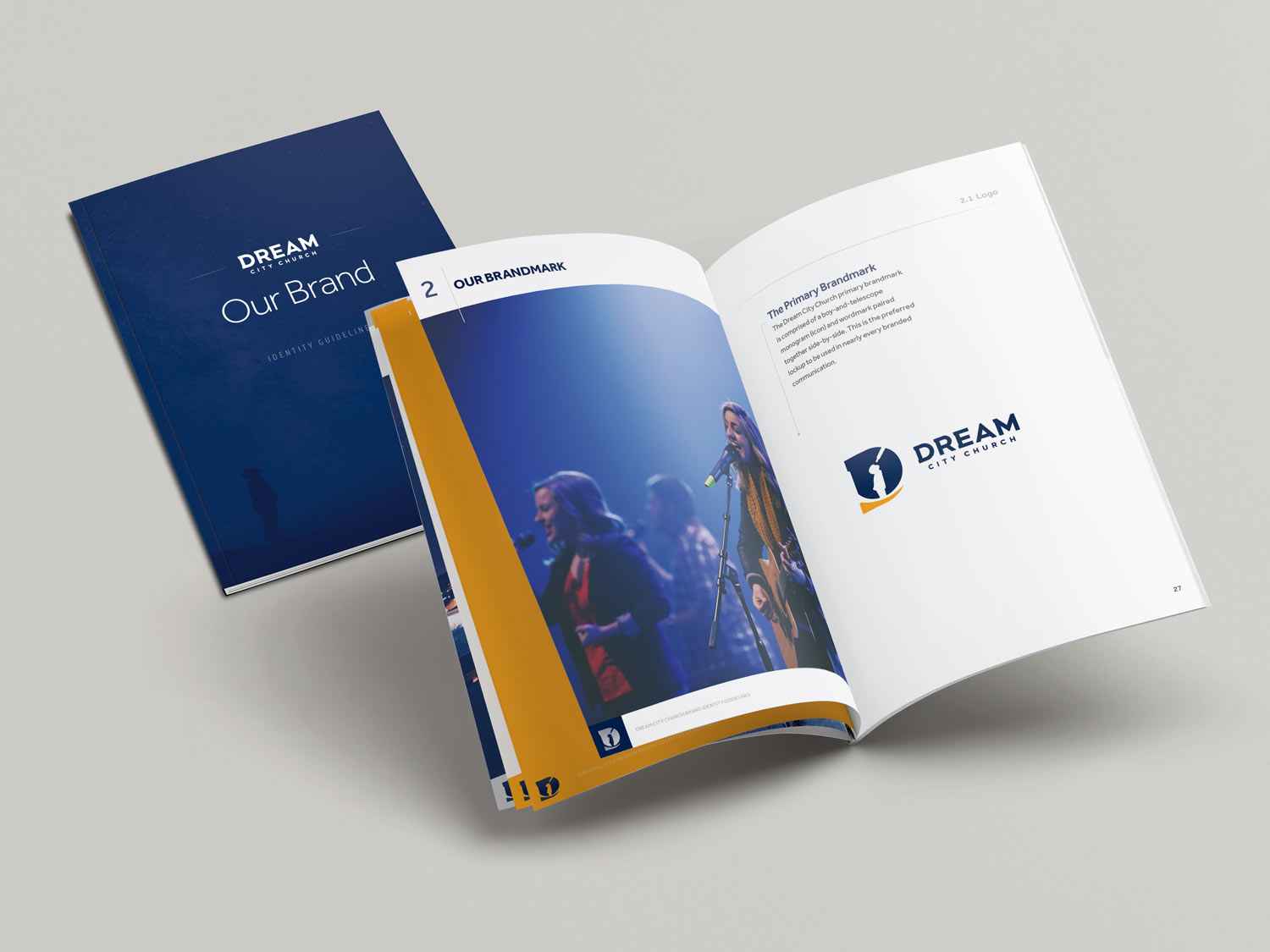 DreamCity_brand_book_open_mockup.jpg