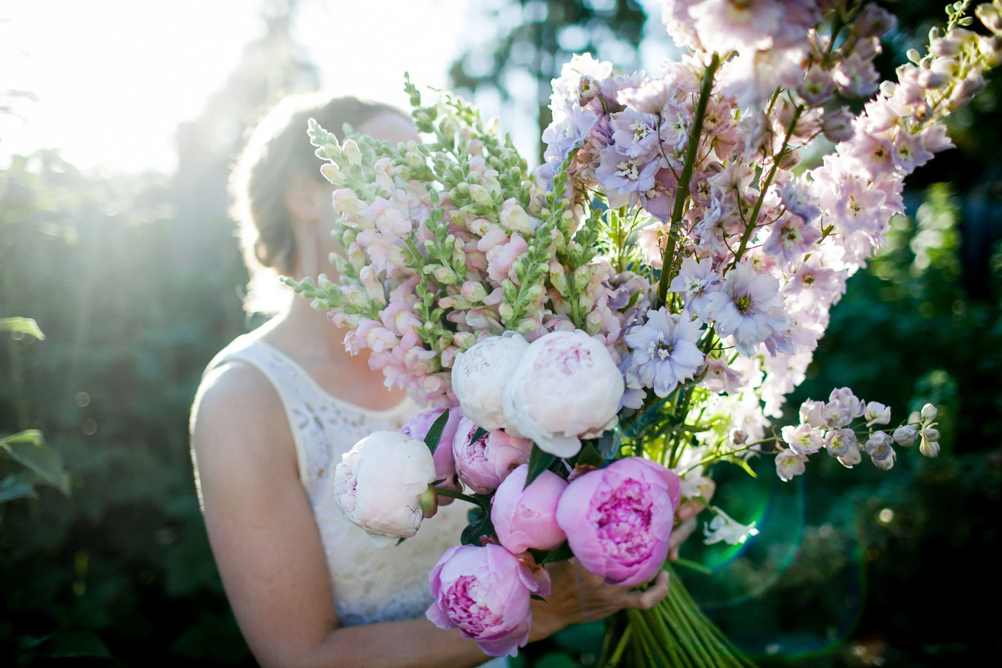flower farmer with peonies