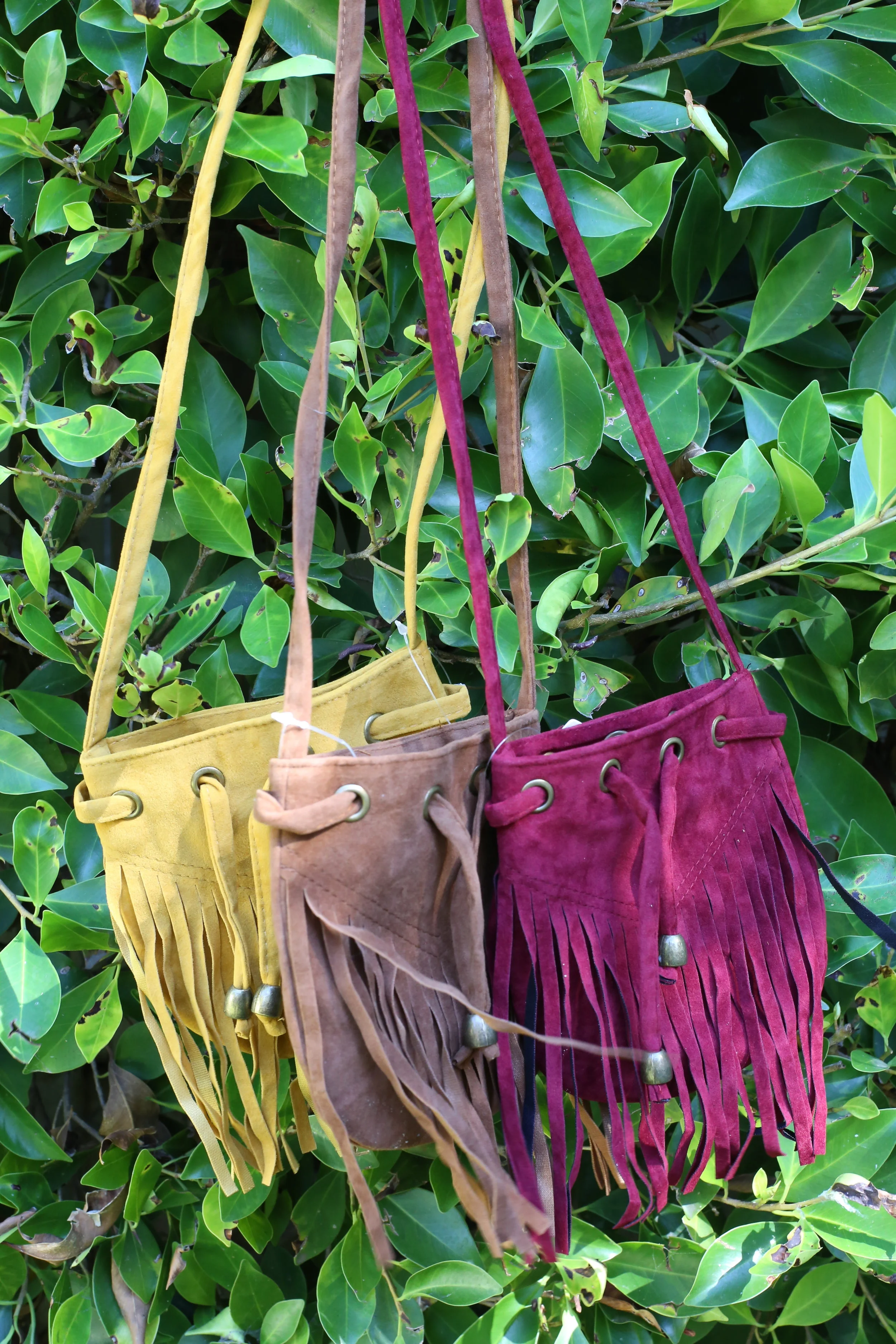 Fringed cross body bags 