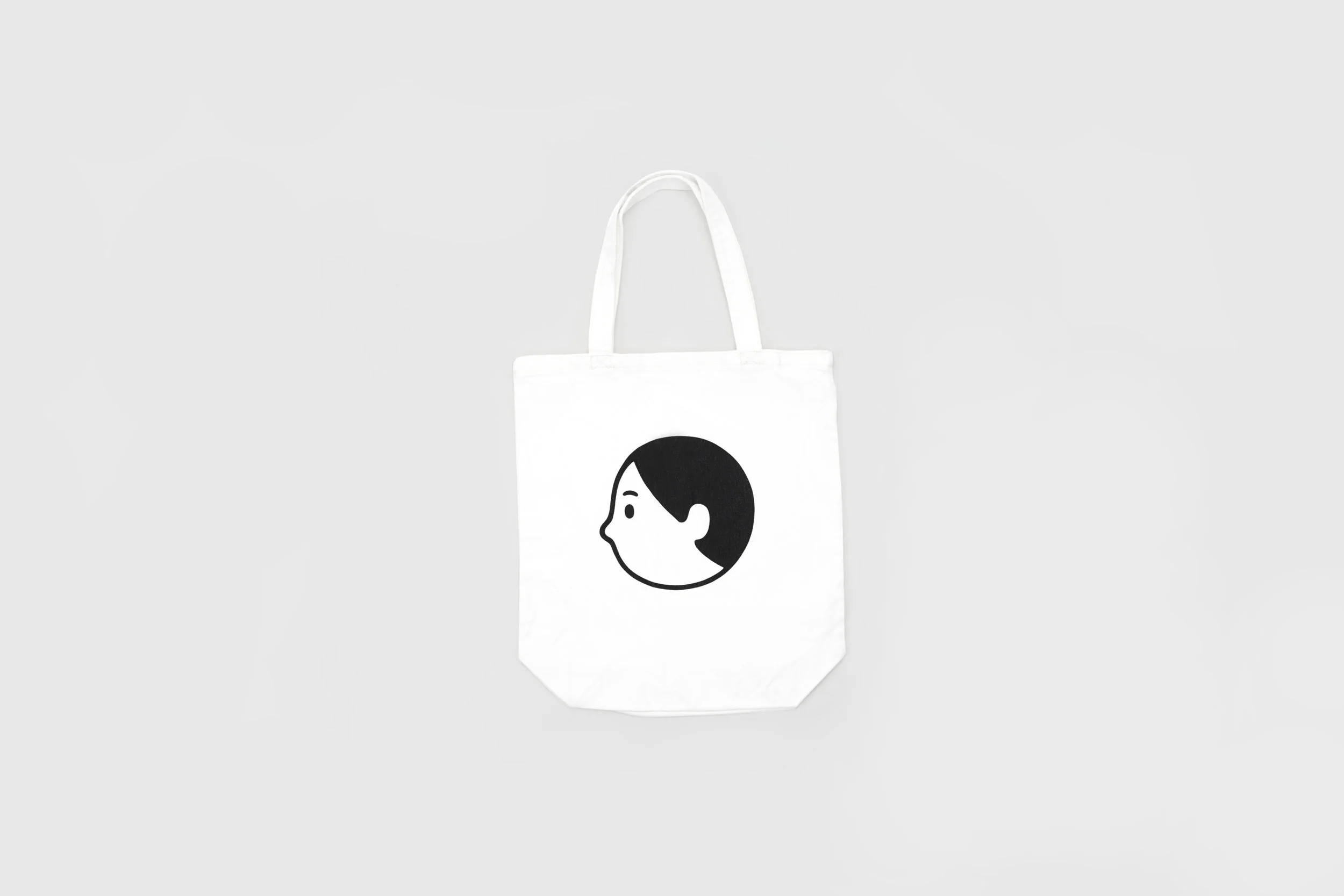 ununliving_noritake_tote-bag_OPEN-EYES_without-phone.jpg