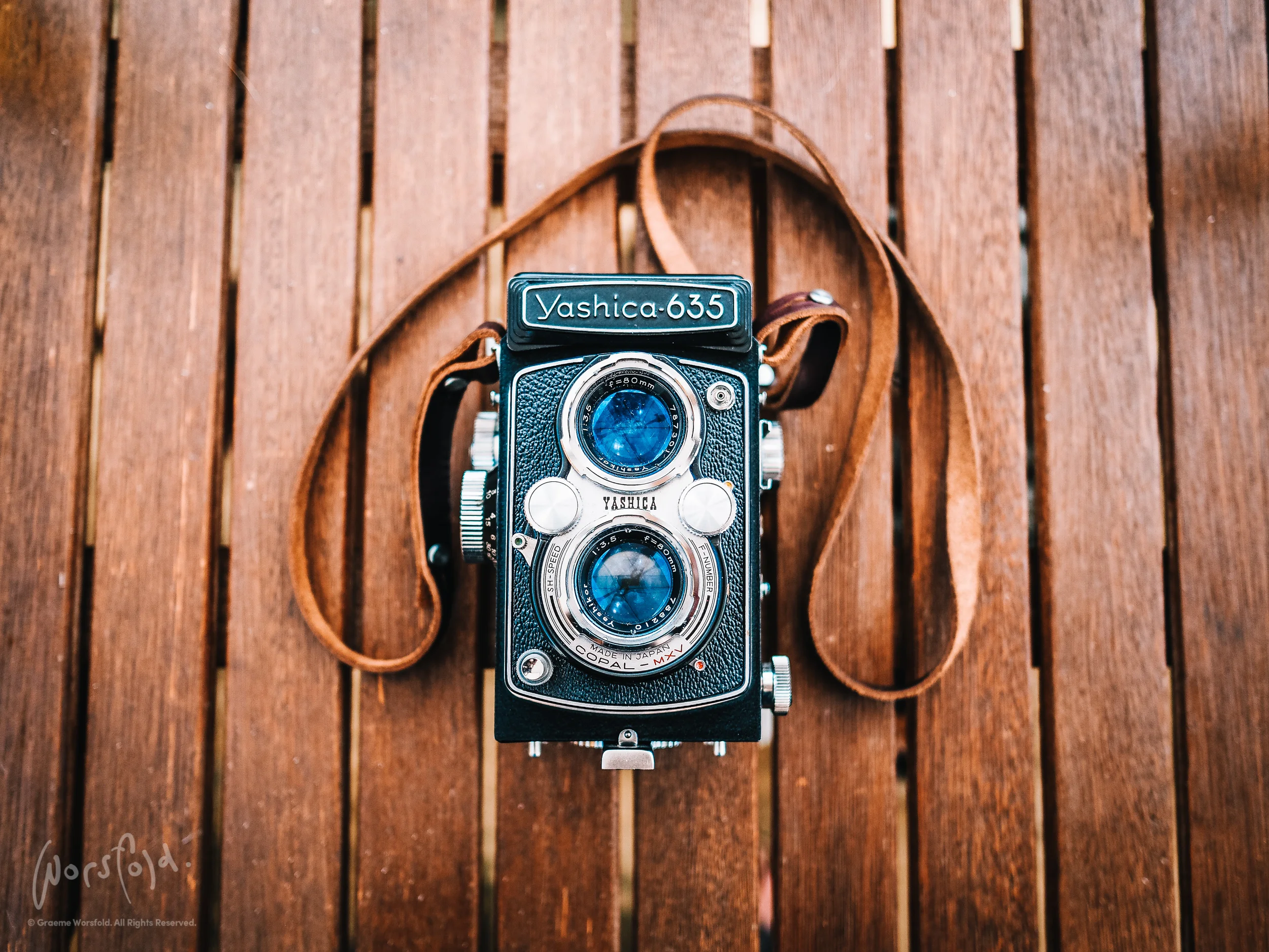 Yashica 635 camera on wooden bench