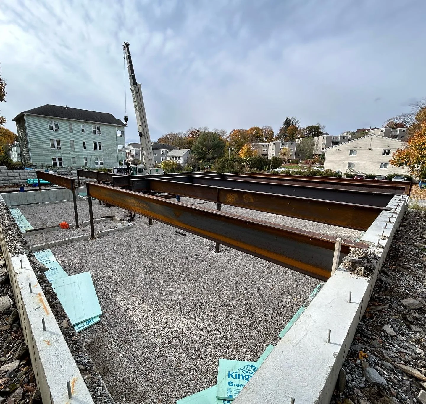 Beam installation complete for an apartment building with basement garage. Thanks for the lift @oleary_crane_service #olearywelding #olearycraneservice #welder #ironworkers #worcester