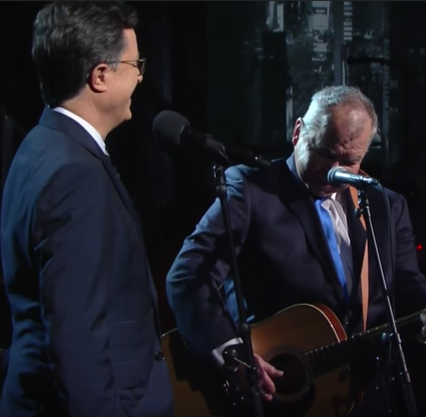 Watch Colbert & Prine do "That's The Way The World Goes Round'