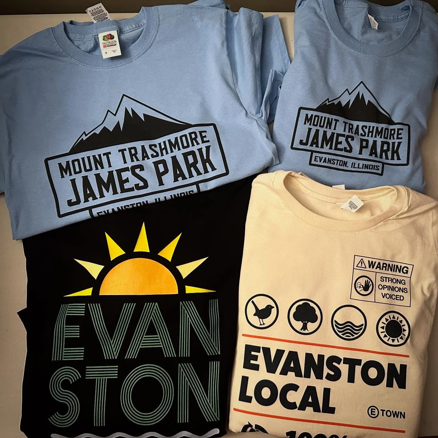 More Cool Evanston Tees 
New @squeezeboxbooks drop .
- get amazing gifts for the Holidaze at Squeezebox .
Main &amp; Sherman . Evanston