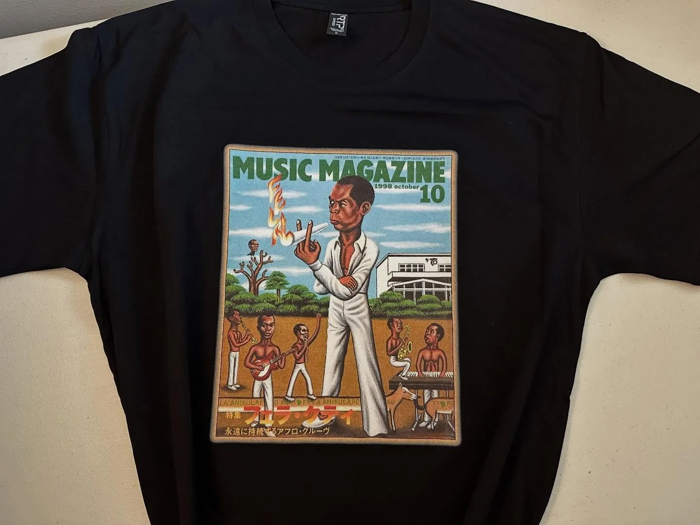 Music Magazine . Japan 1998
Fela Kuti Custom 
.
https://goaheadmerch.com/recent-additions/music-magazine-fela-kuti-tshirt