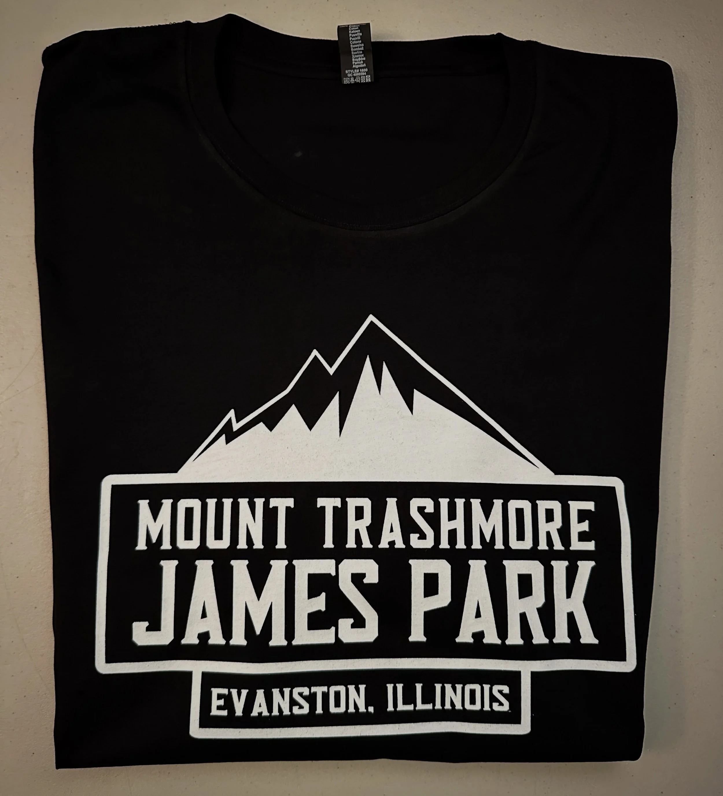Mount Trashmore 
James Park . Evanston 
Black Tee 
.
https://goaheadmerch.com/evanston/trashmore