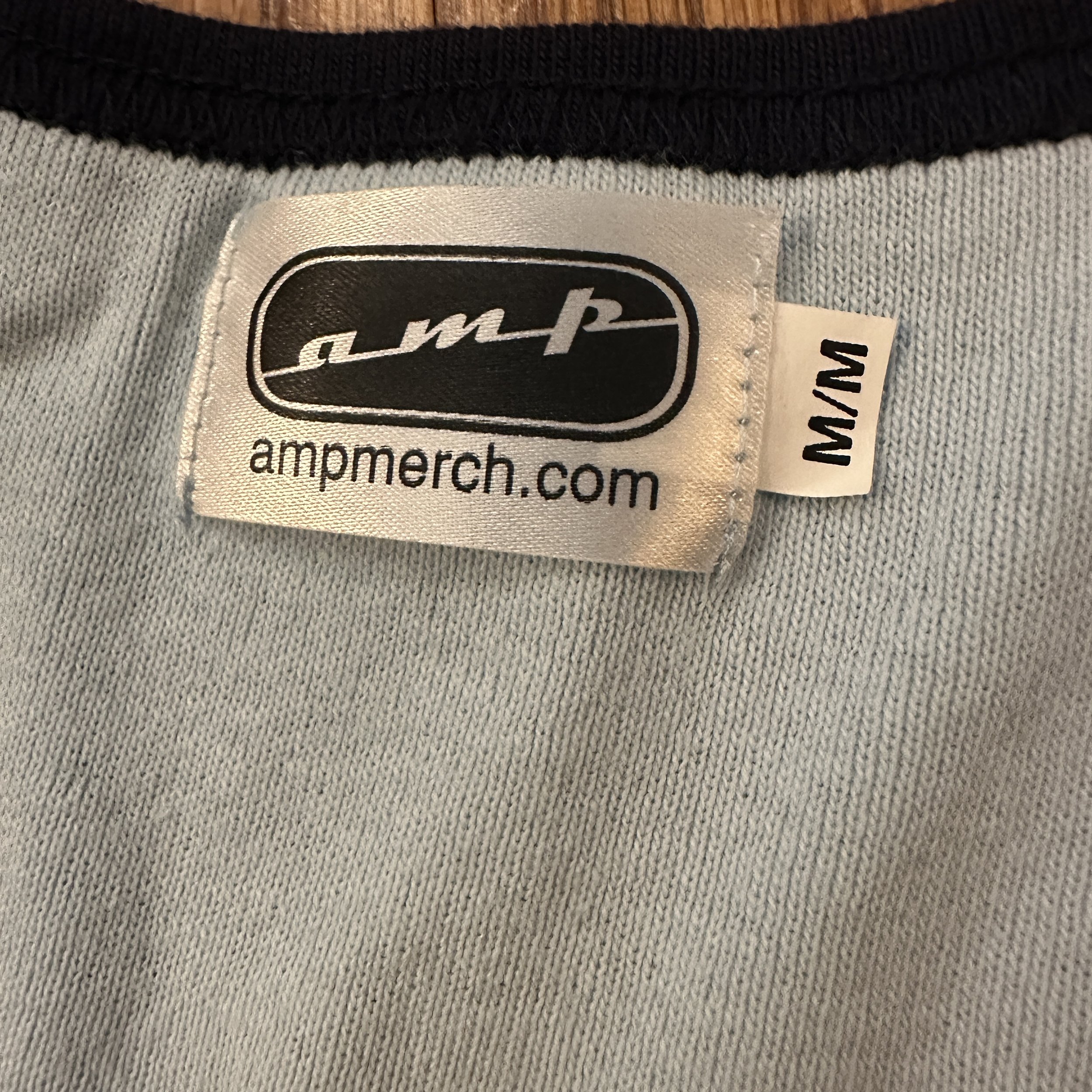 BHIC_DiamondsOnTheInside_Ladies_Blue_TShirt_LaundryTag.jpg