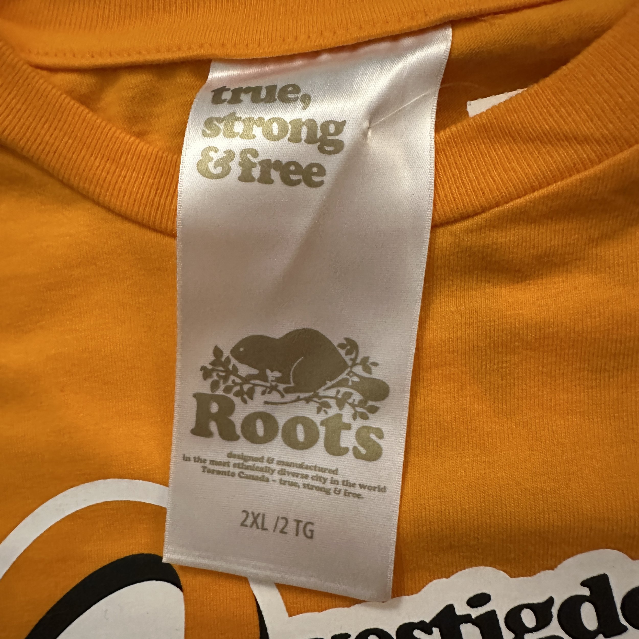 Roots_Vestigde_73_Orange_TShirt_LaundryTag.jpg