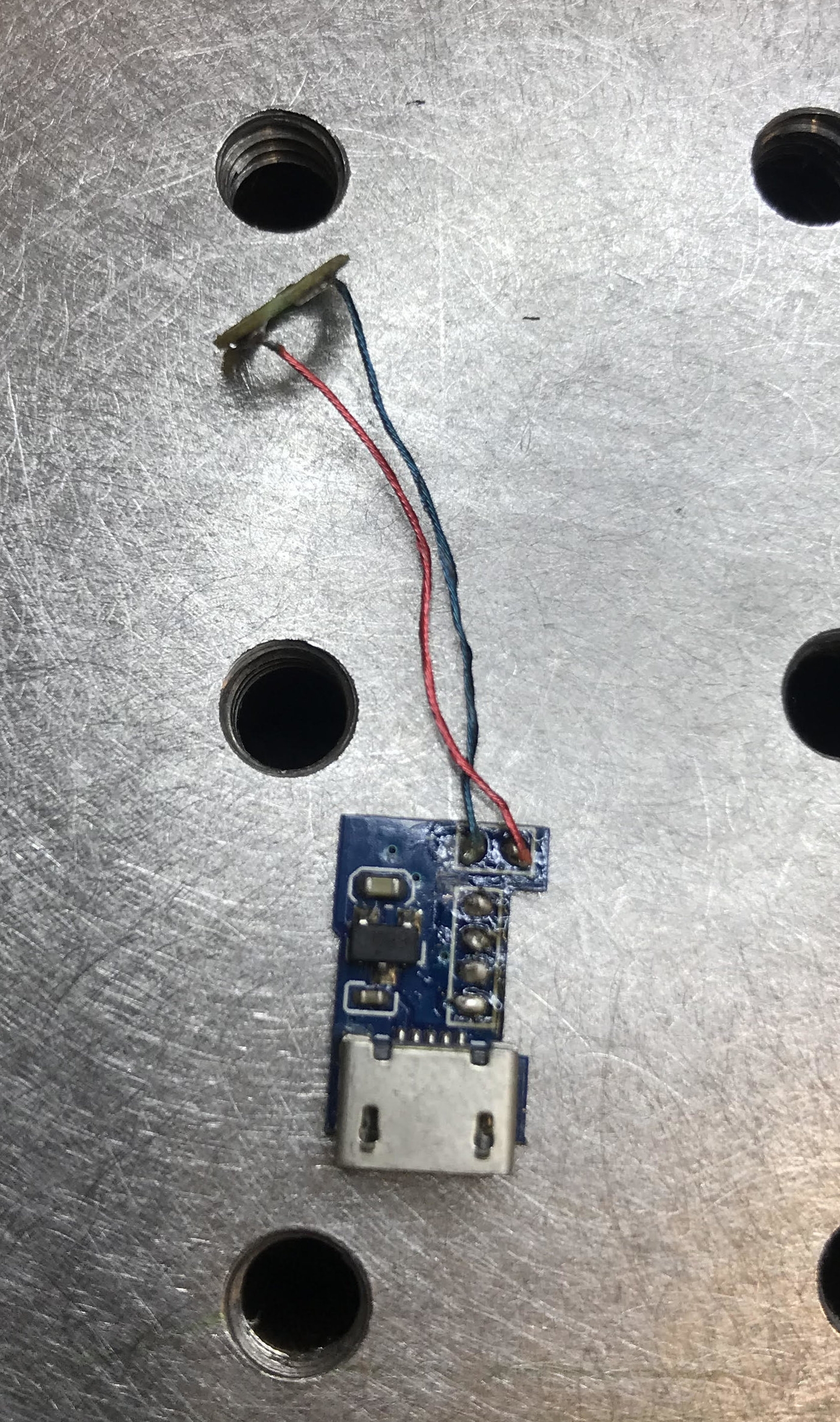 Removed micro USB charging port