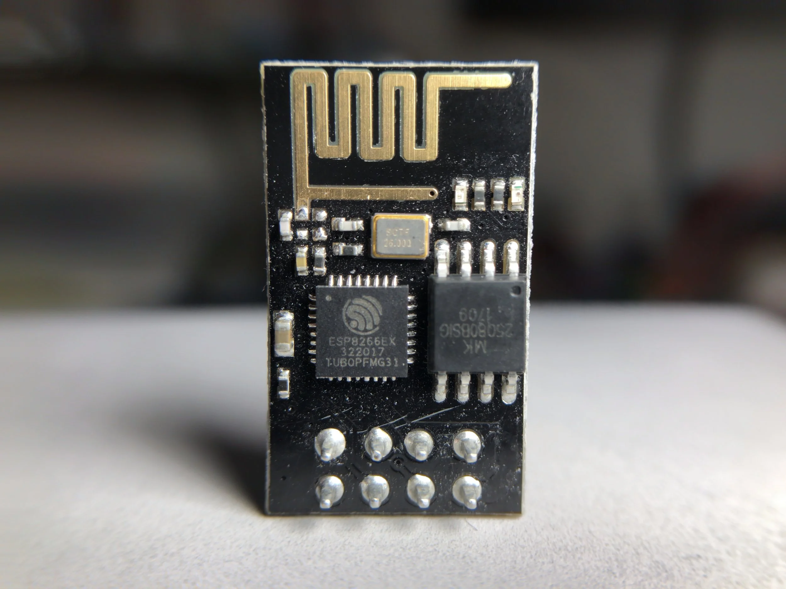 Figure 1: ESP8266 module with 8 breakout pins. This module is just over $3 when bought in a 4-pack, and even cheaper at times.