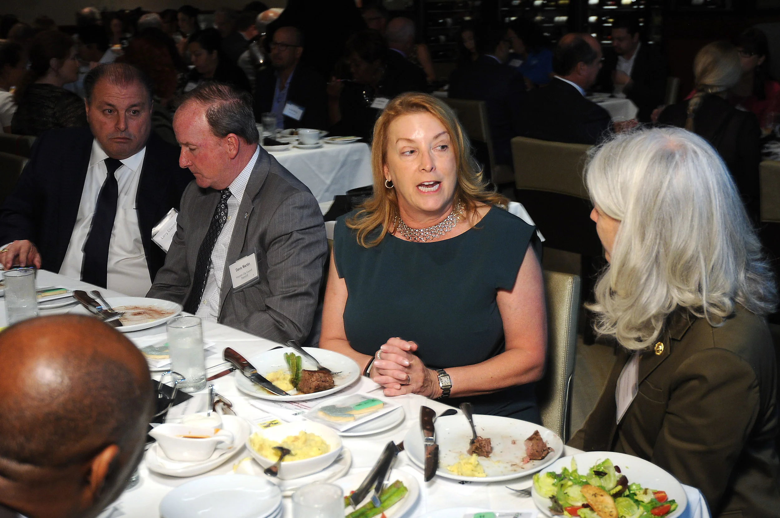  Christine Holland speaks to Councilmember Cisneros and Mayor Turner  